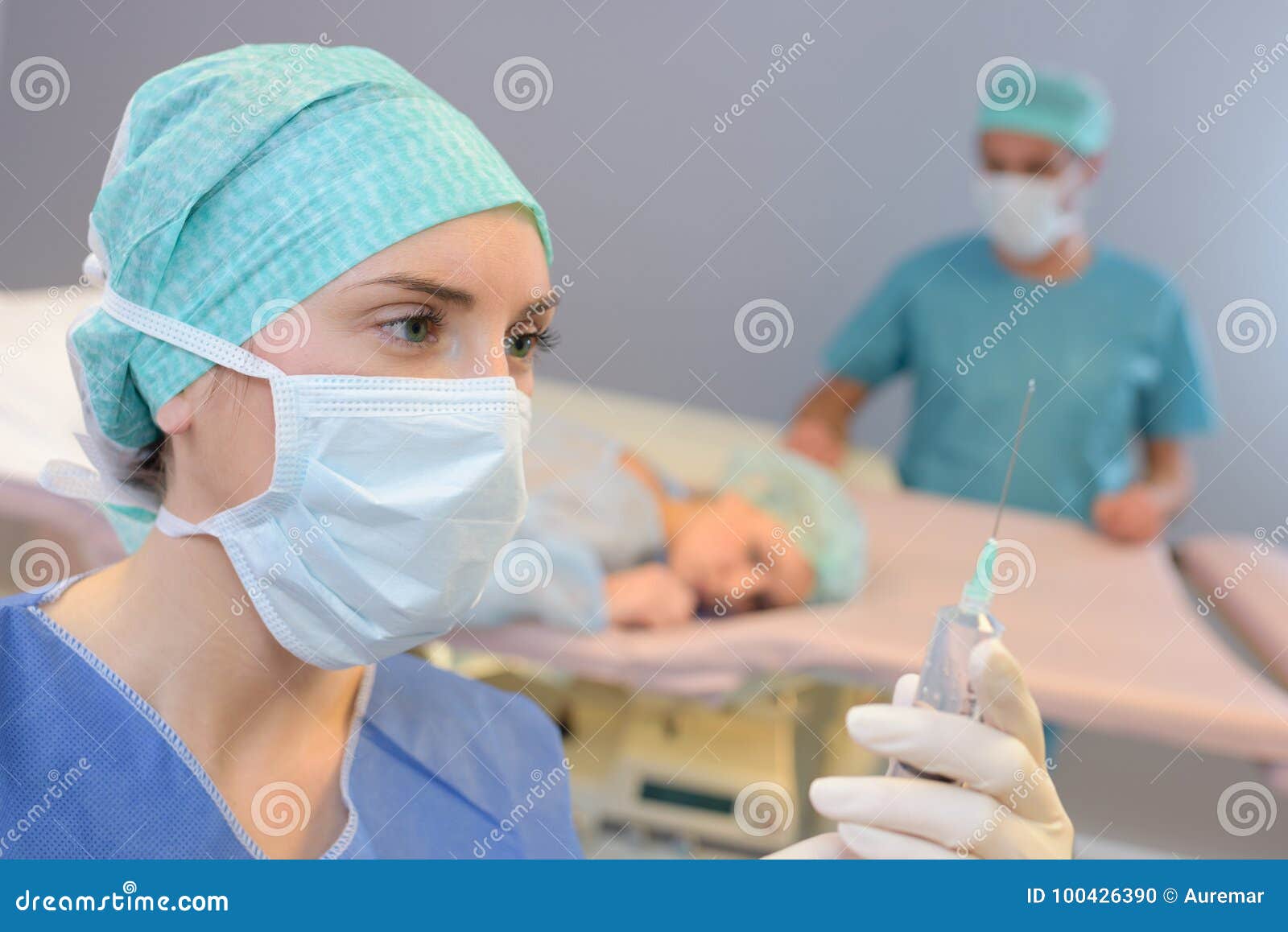 Removing air from syringe stock photo. Image of patient 100426390
