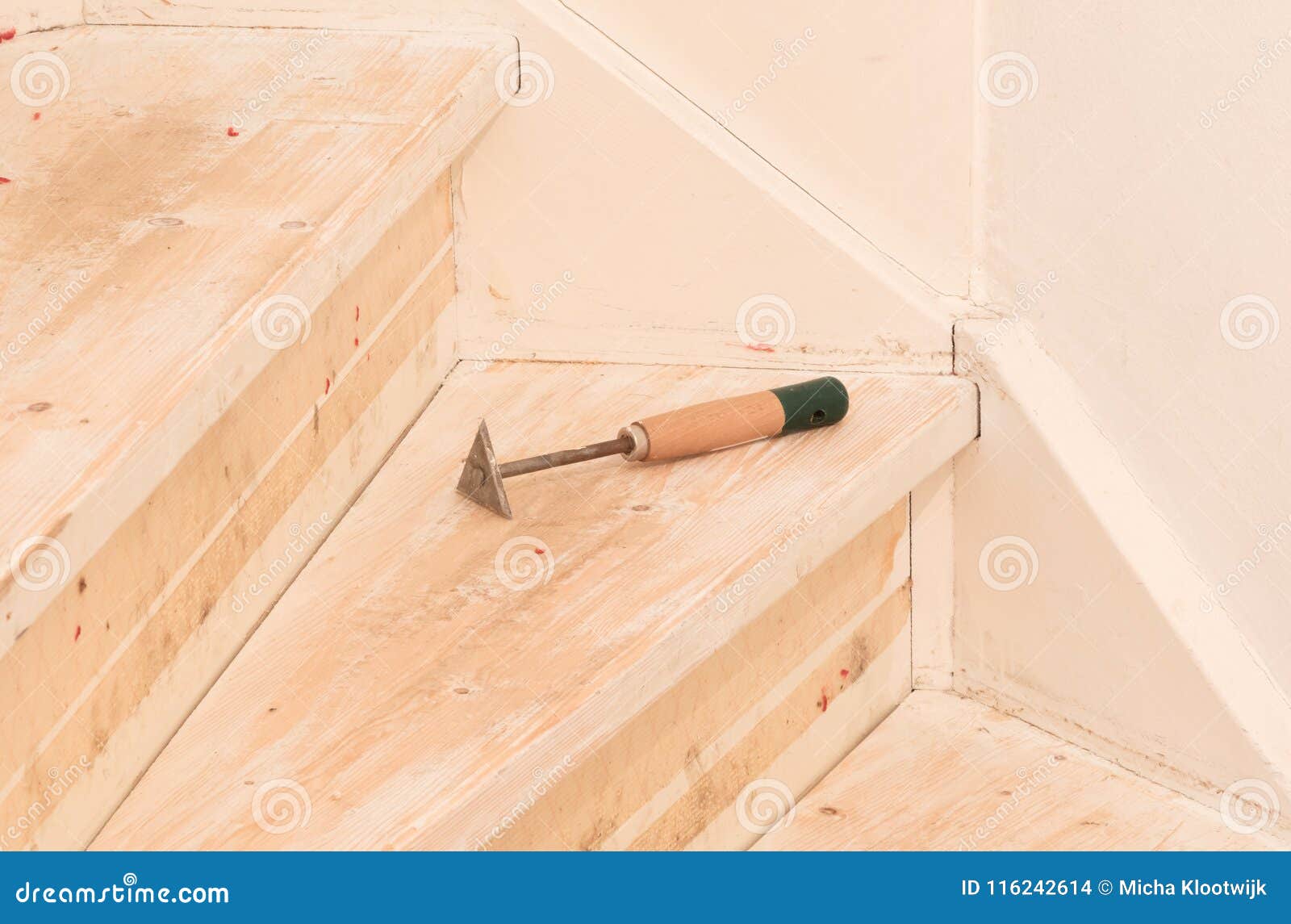 Removing Carpet Glue And Paint From An Vintage Stairs Stock Photo