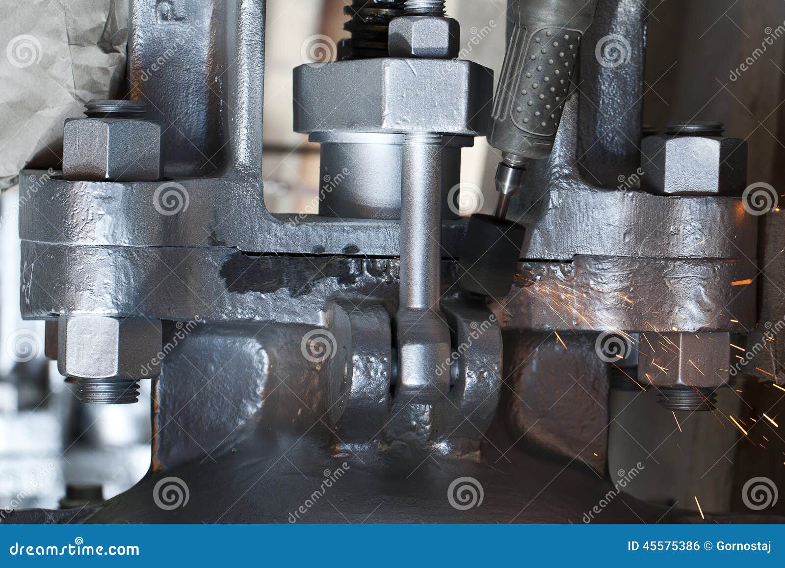 Removing of Marking from Valve Body Stock Photo Image of fasteners