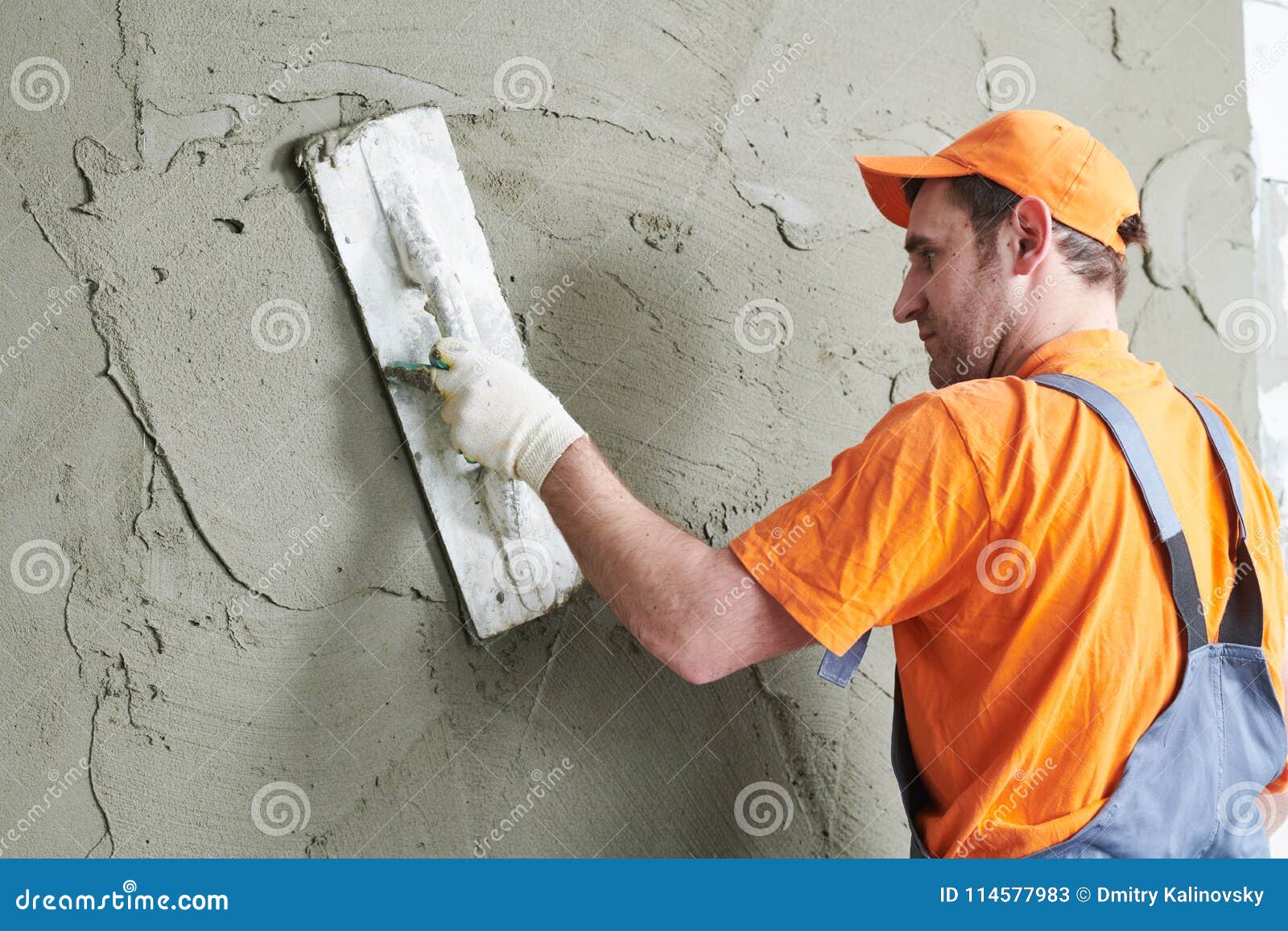 Renovation. Plasterer Putting Plaster on Wall. Stock Image Image of