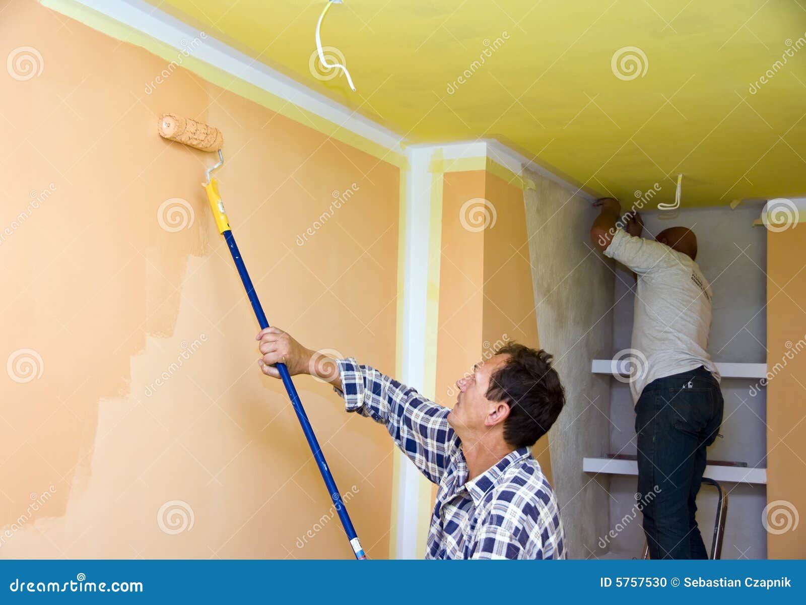 renovation team painting room