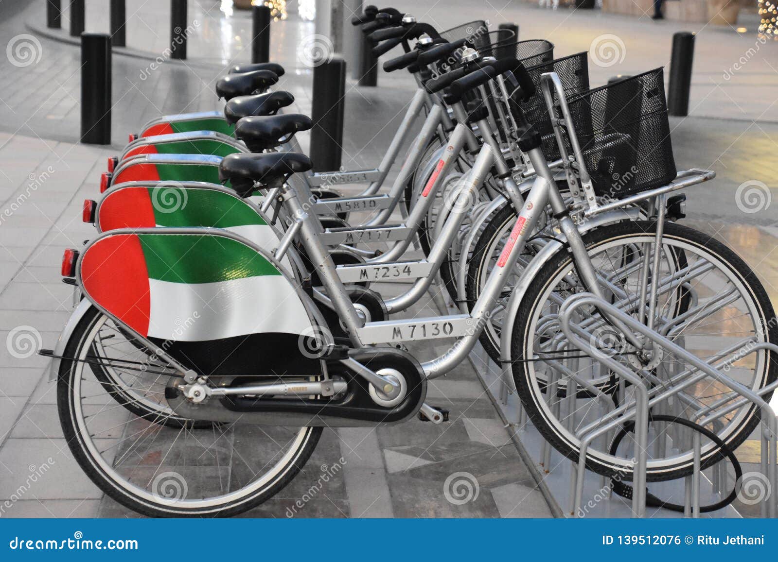 Rental bikes in Dubai, UAE editorial photo. Image of city