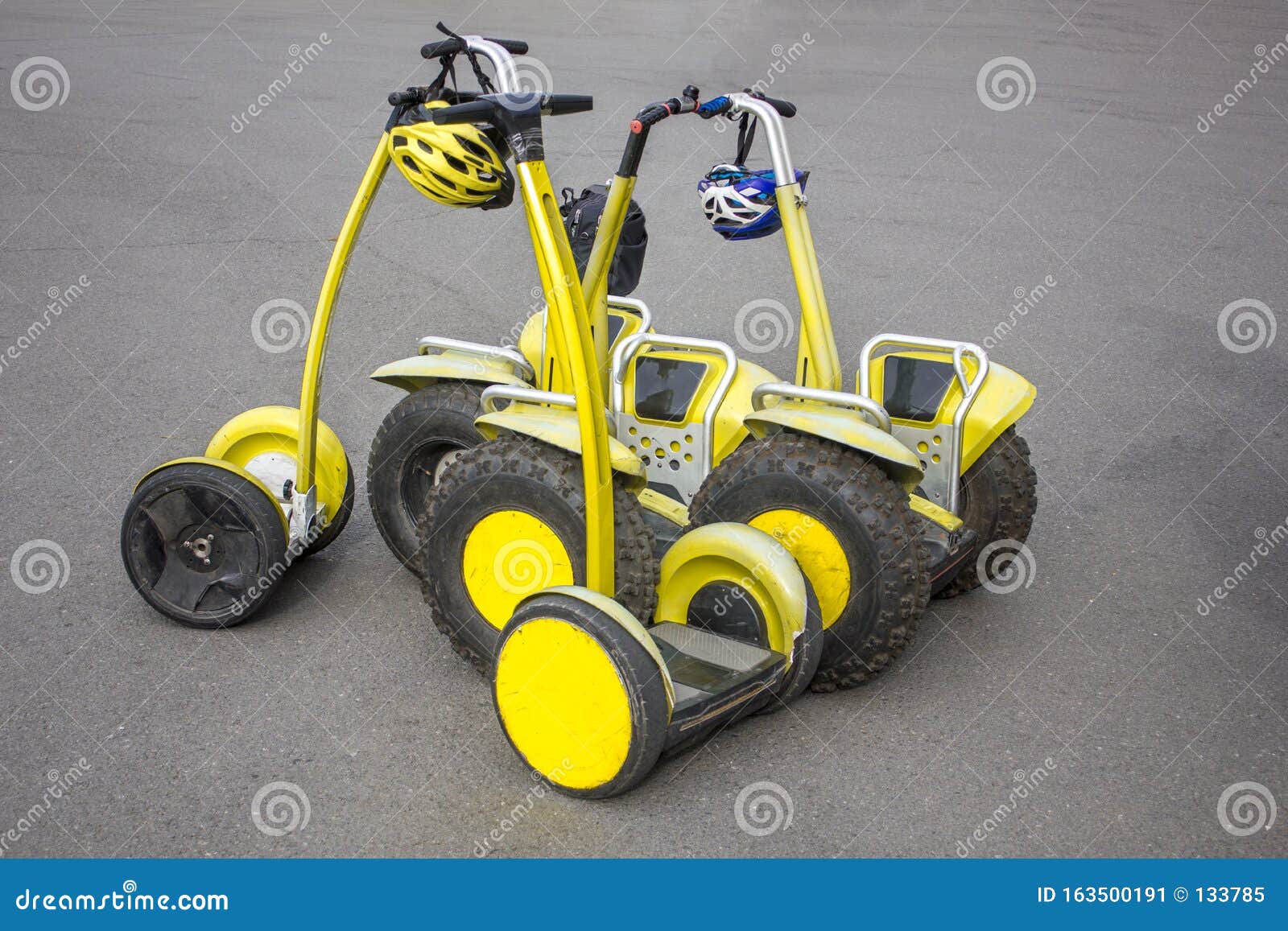 Rental Bright Yellow Hoverboards with Large Wheels and Bicycle Safety
