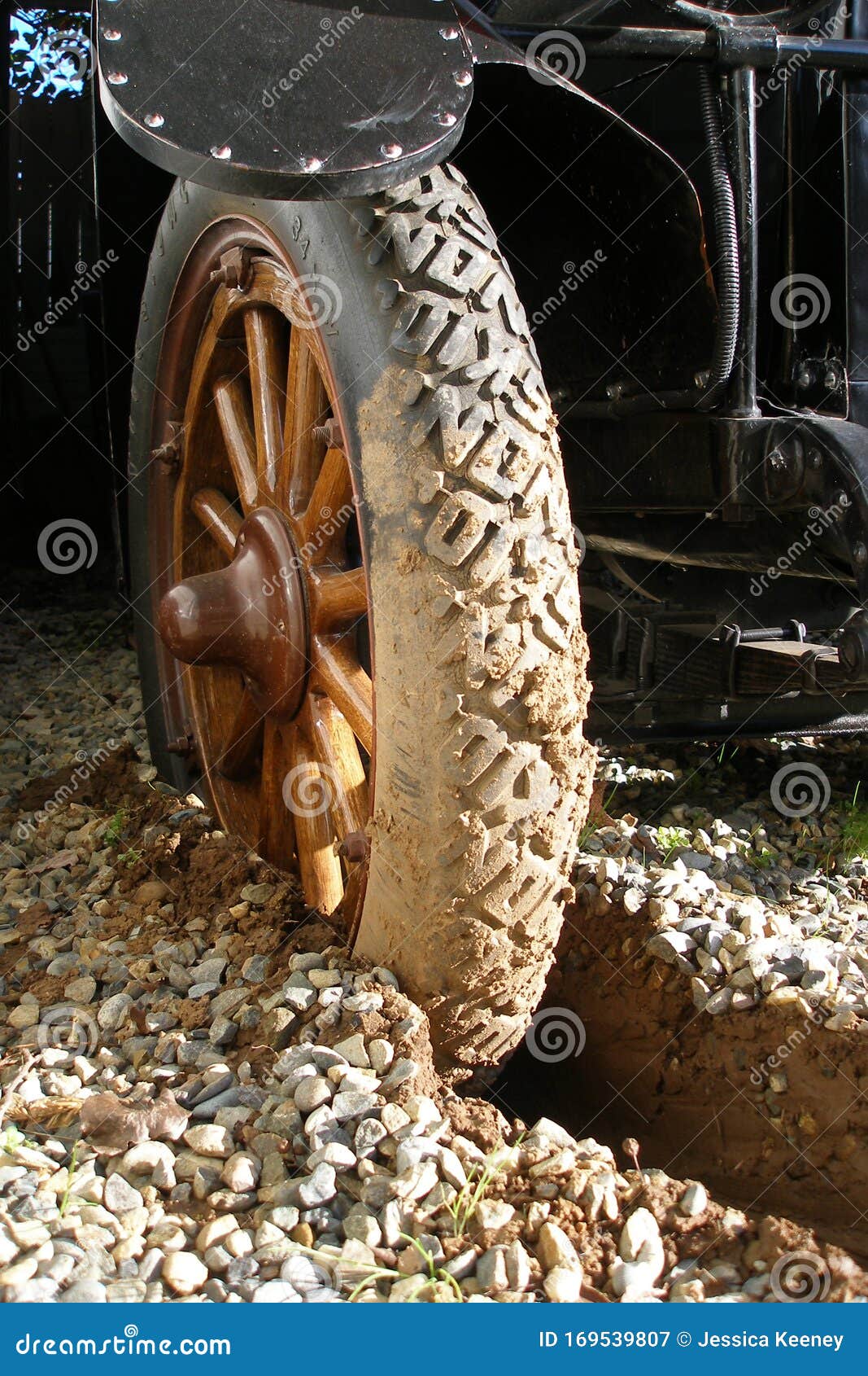 reo tire buried in mud