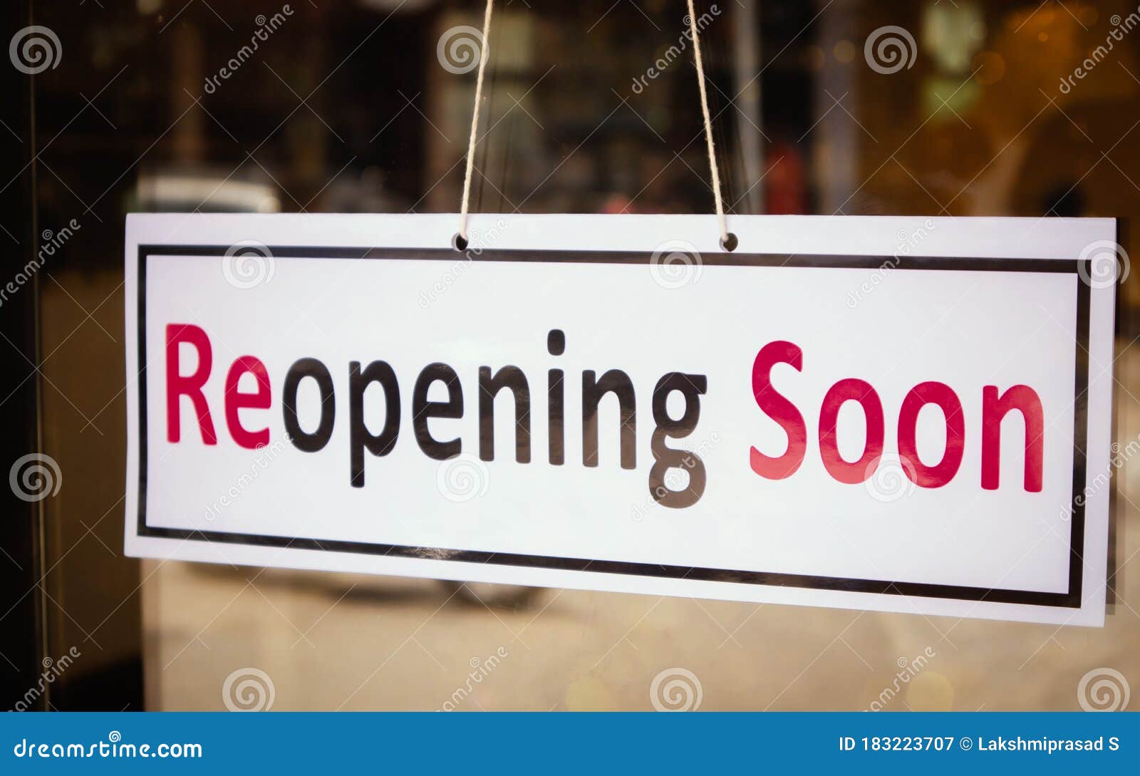 reopening soon signage board in front of businesses or restaurant door after covid-19 or coronavirus outbreak - concept