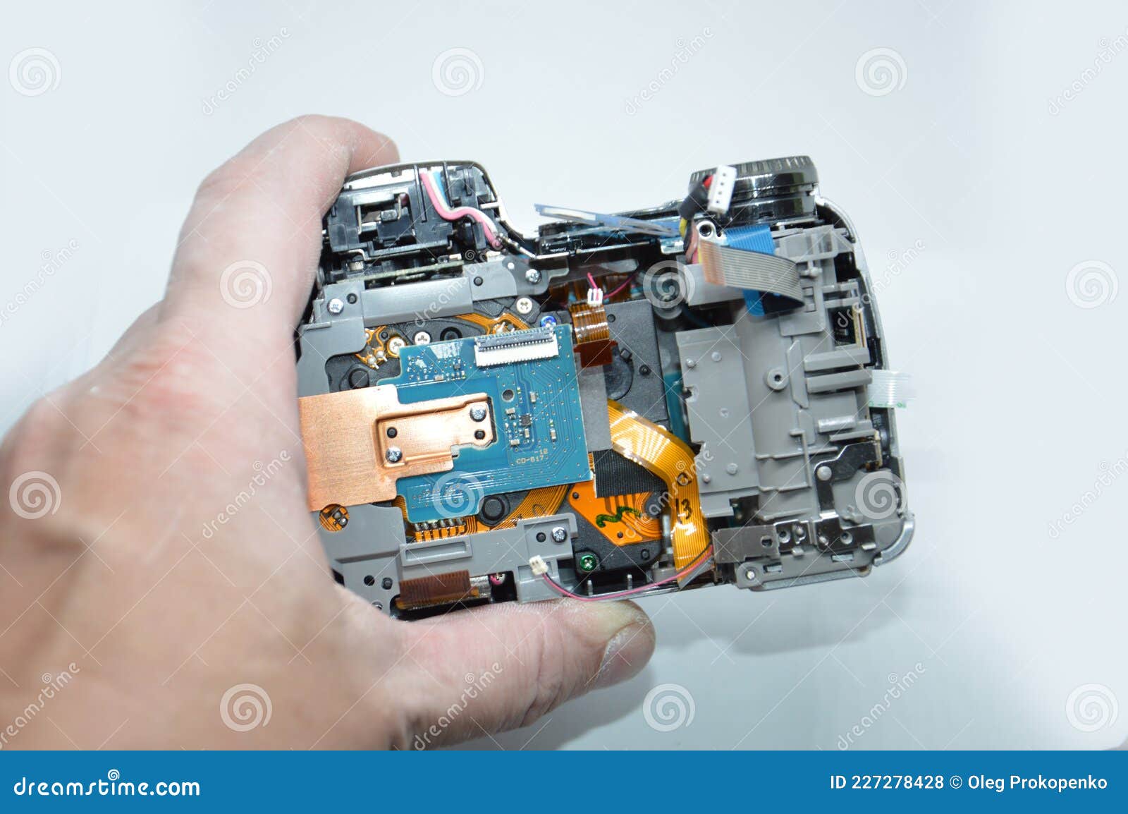Repair and Disassembly of a Digital Camera Stock Photo Image of