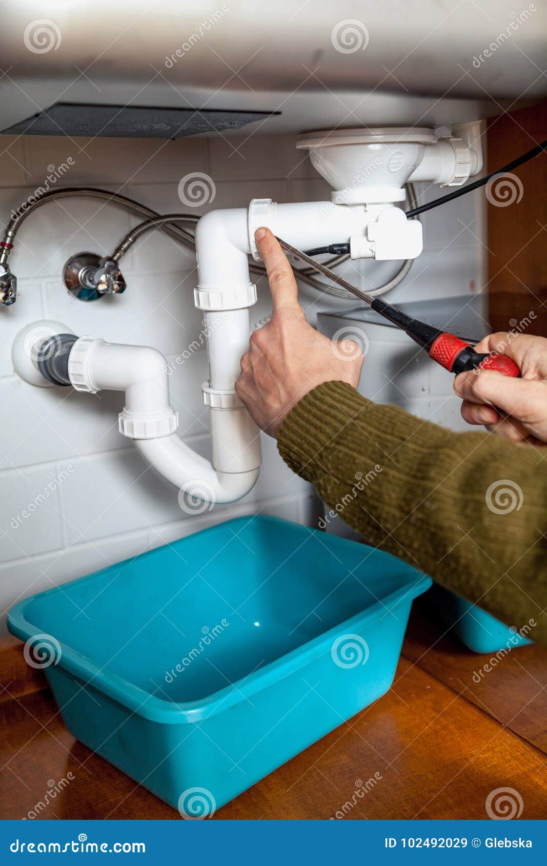 Repair Of Kitchen Weir With Screwdriver Stock Image Image