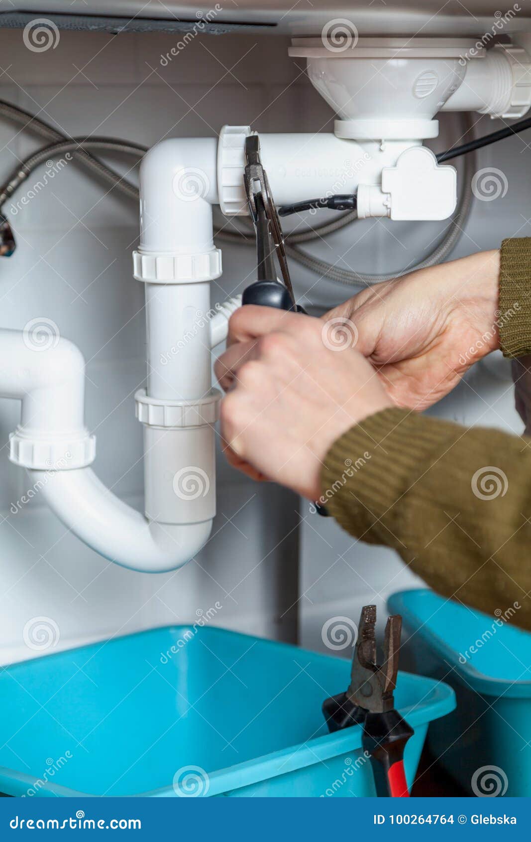 Repair Of Kitchen Overflow Pipe Wrench Closeup Stock Photo