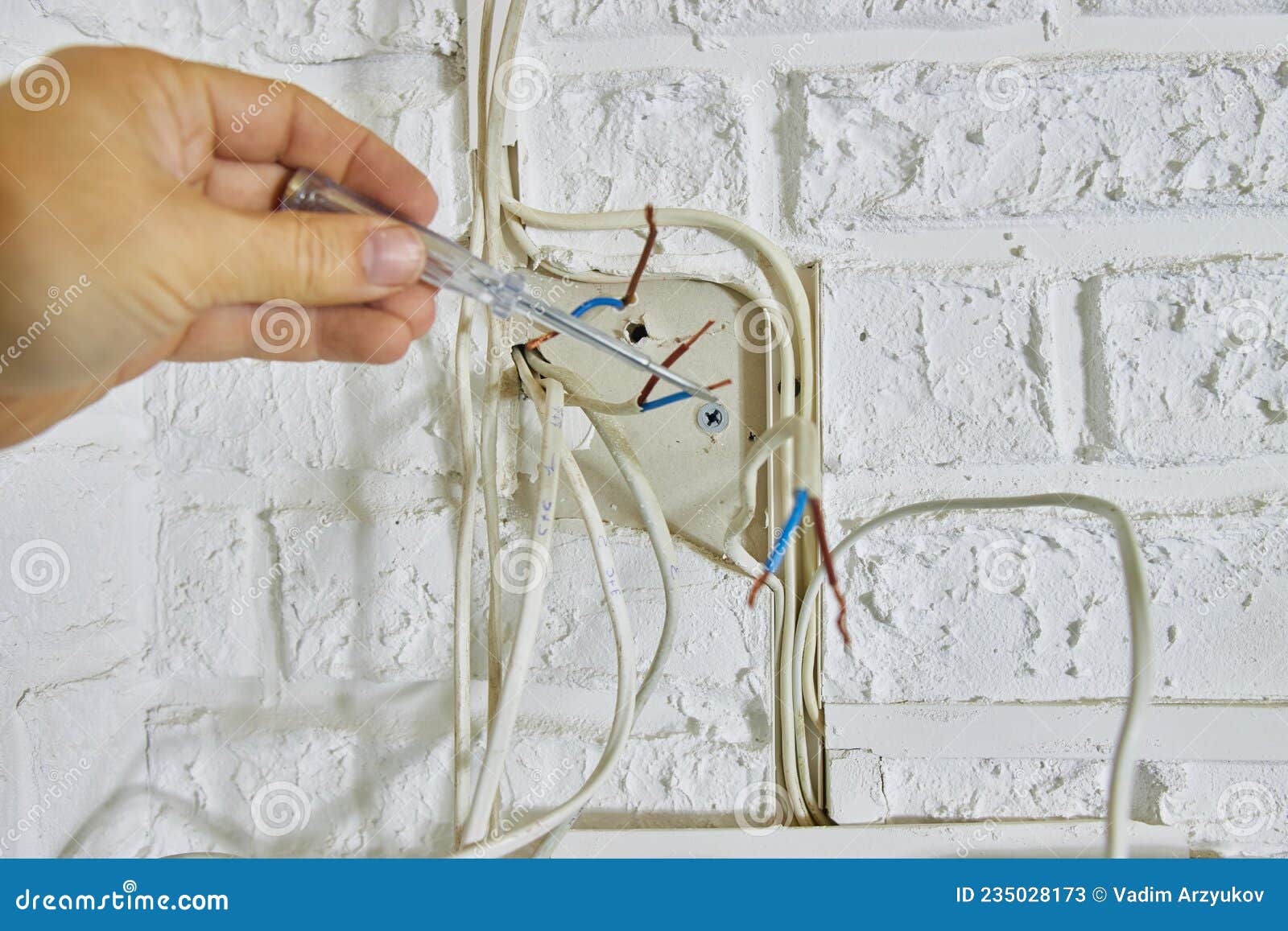 Repair and Replacement of Electrical Cables in the House Stock Image