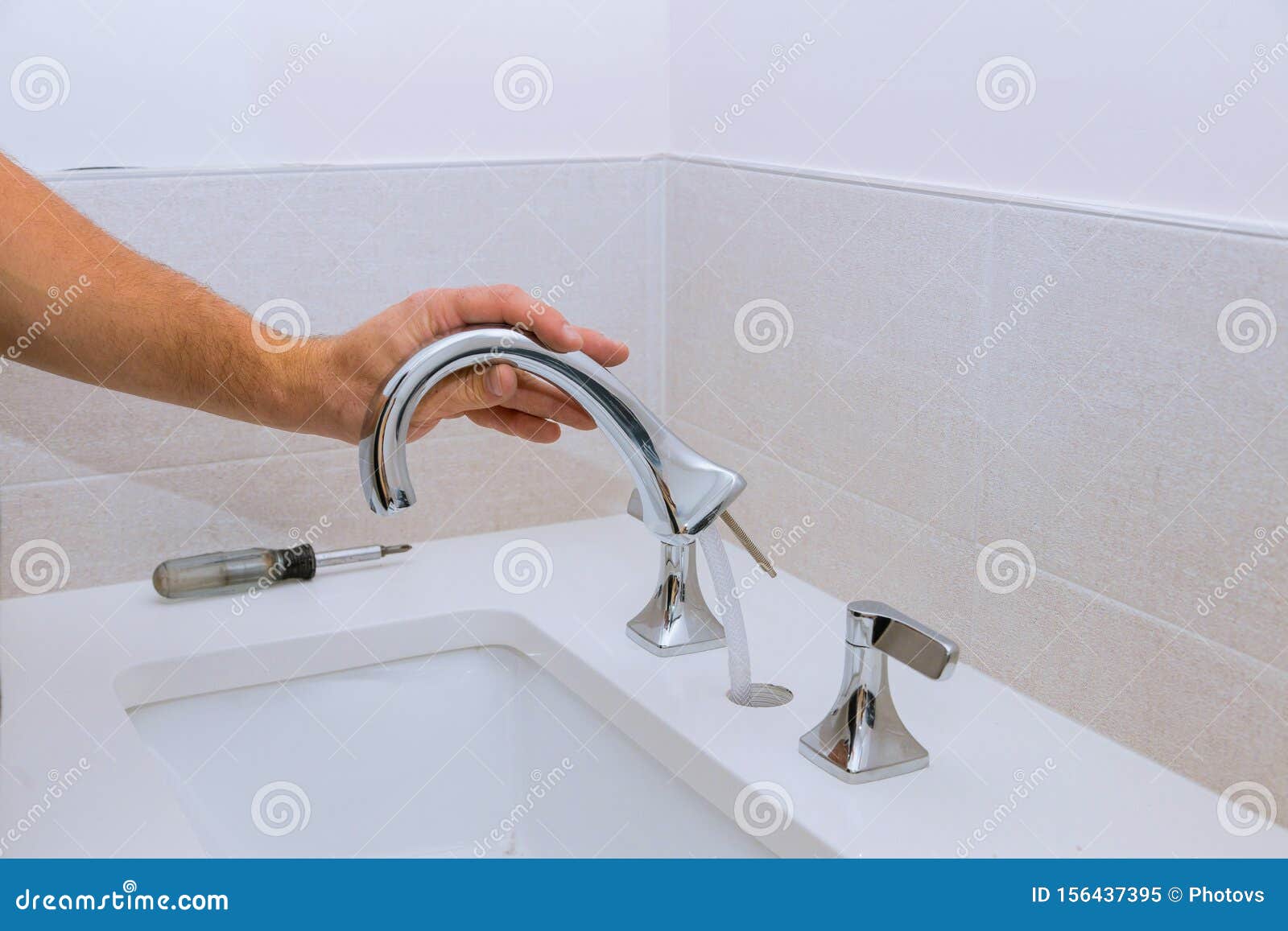 Repair Service Assemble New Faucet Lies On The Ceramic Sink Stock