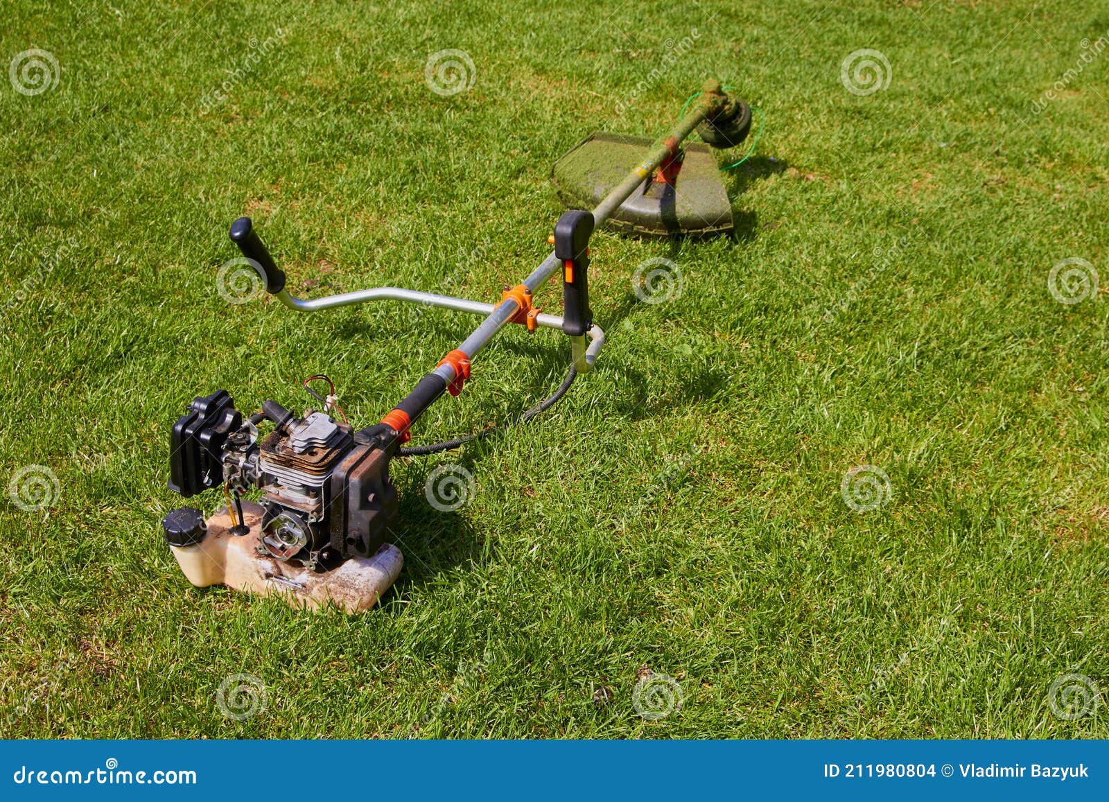 Repair String Trimmer,broken Garden Trimmer and Lying on the Grass