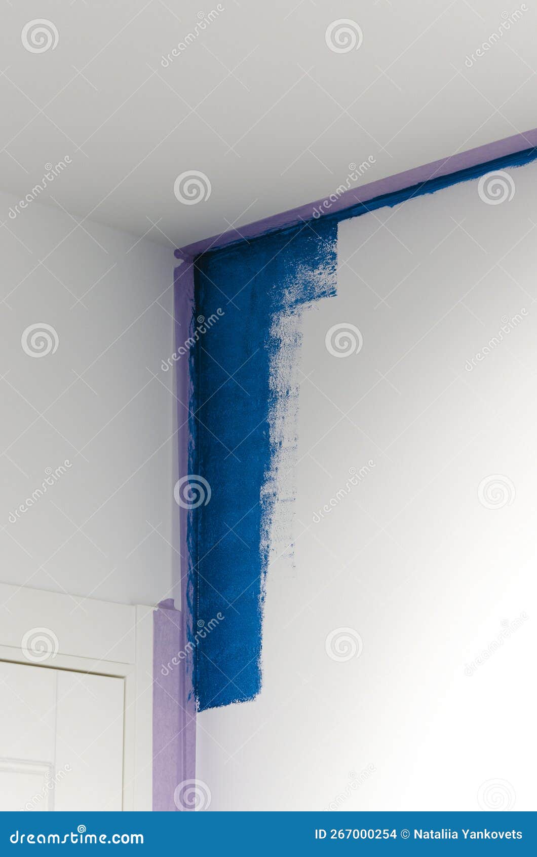 Repair. White Wall in Blue Staining Process Stock Photo Image of blue