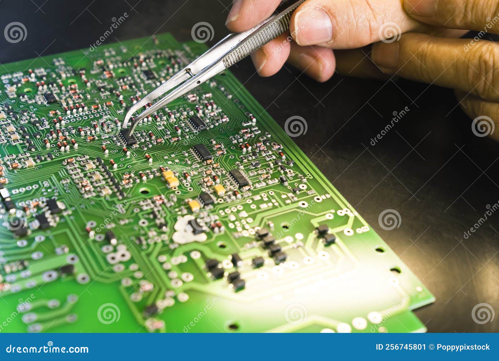 Repairing Process Of A Broken PCB. Professional Caucasian Engineer Repairing Process Of A Broken PCB. Professional Caucasian Engineer