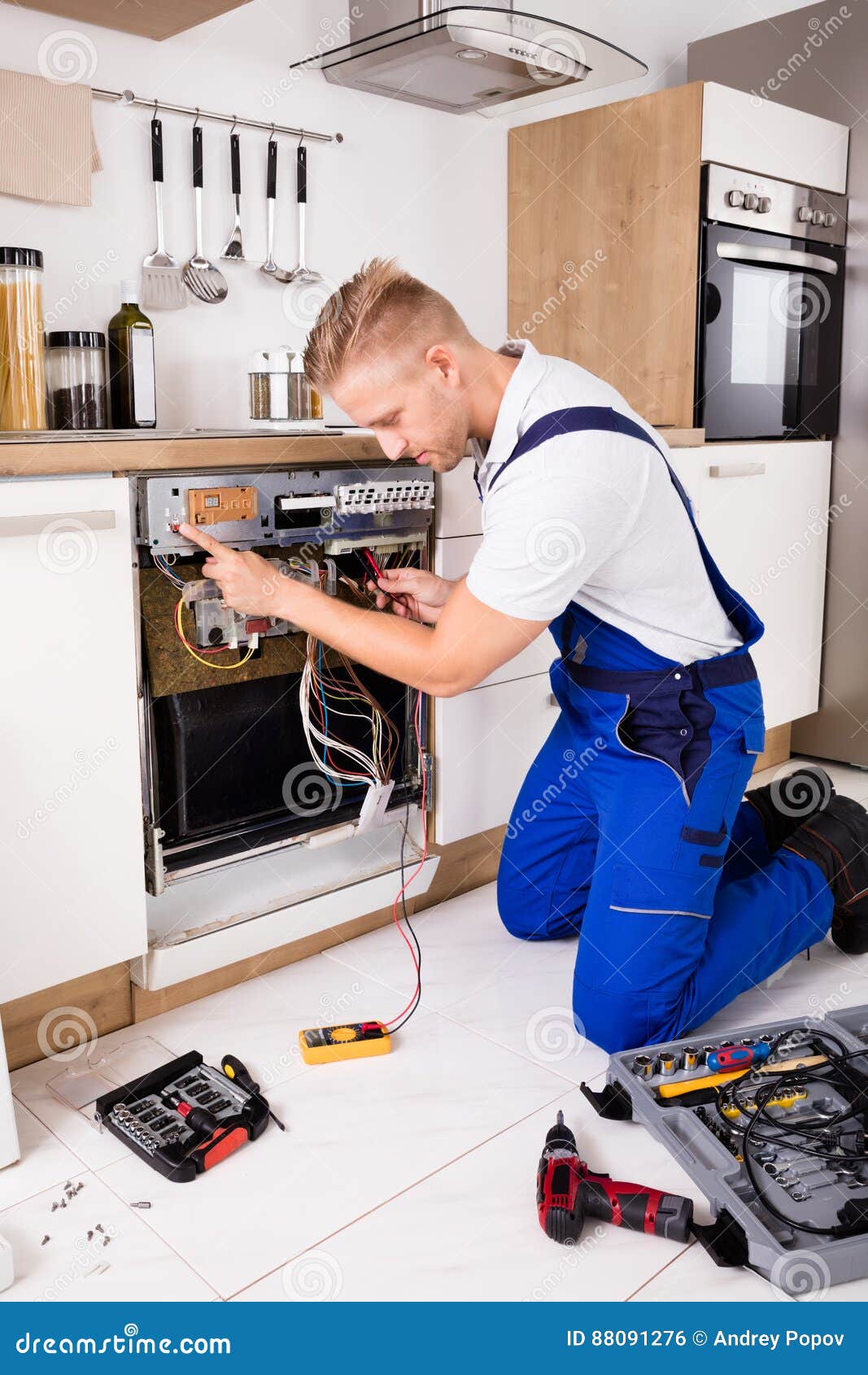 Repairman Checking Dishwasher Stock Photo Image of home, checking