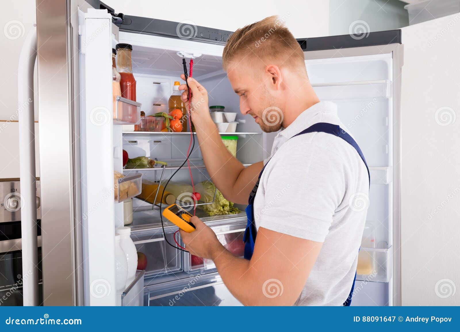 Repairman Checking Refrigerator Stock Image Image of electrical