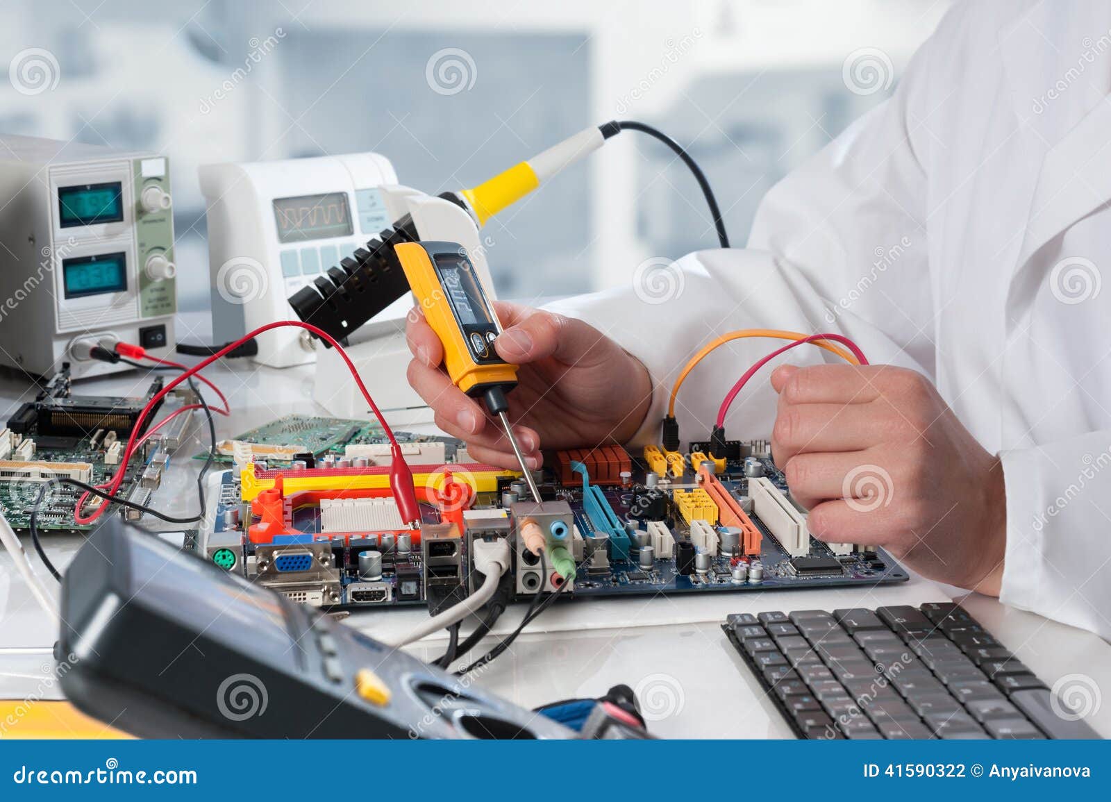 Repairman Fixes Electronic Equipment Stock Photo - Image ...