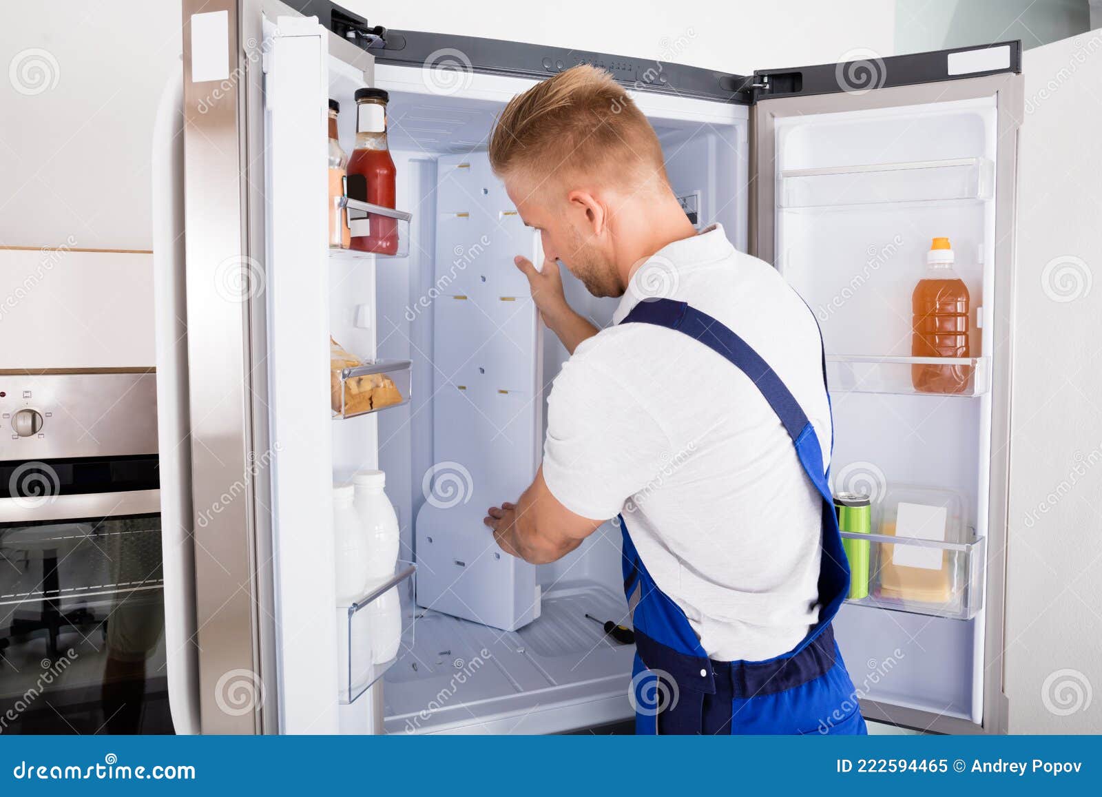 Repairman Fixing Refrigerator Stock Image Image of adult, check