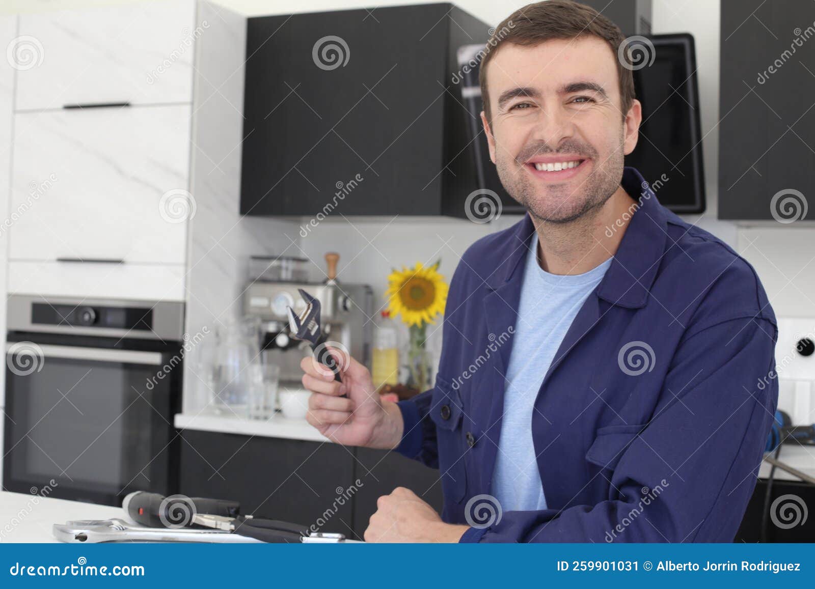 Repairman Holding Tool in the Kitchen Stock Image Image of leak