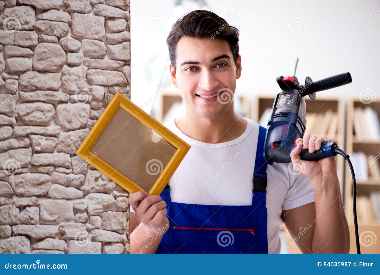 The Repairman Putting Picture Frame Onto Wall Stock Image Image of