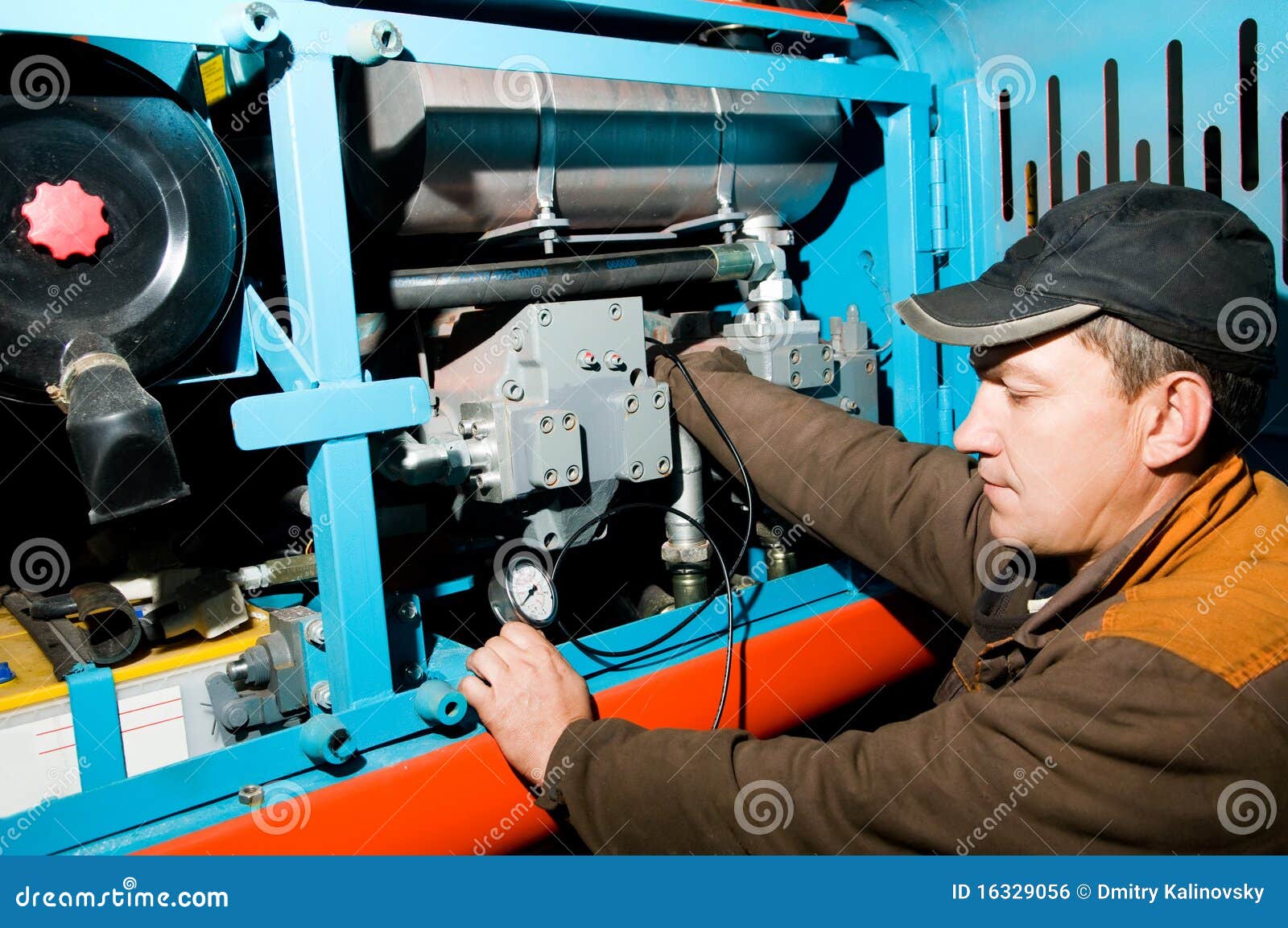 repairman using manometer