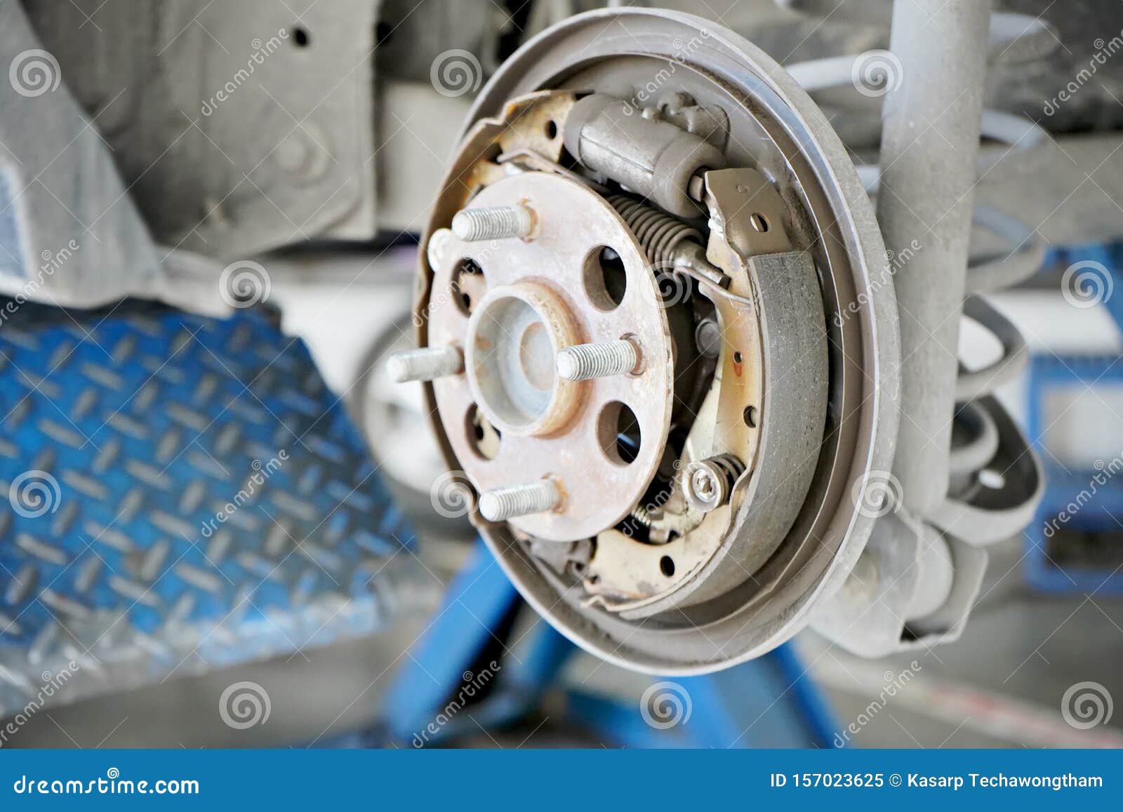 Replacement of Car Brake Pads in Garage. Worn Brake Pads ,selective