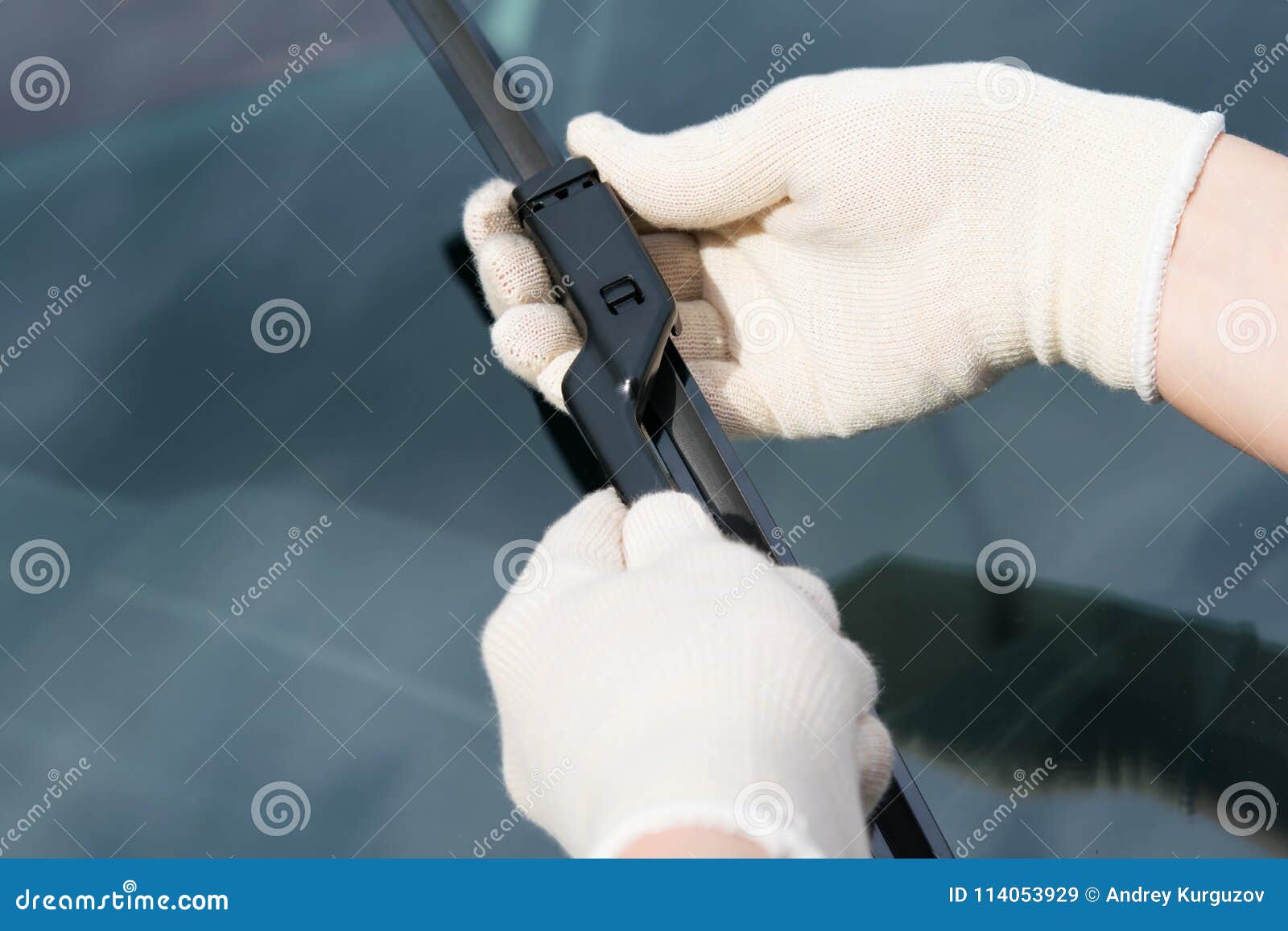 Replacement of Windscreen Wipers, Specialist in Rag Gloves Stock Image