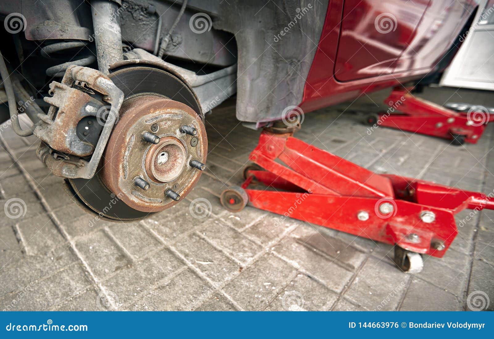 Replacing the Wheels on a Car on the Service Stock Photo Image of