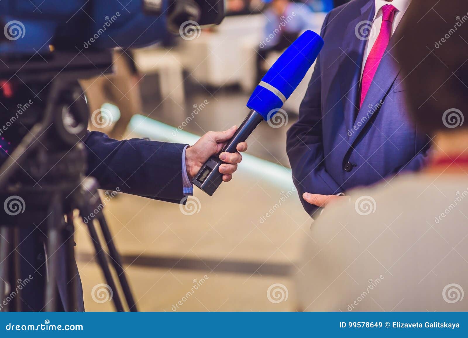 The Reporter`s Hand Holds the Microphone. Takes an Interview Stock