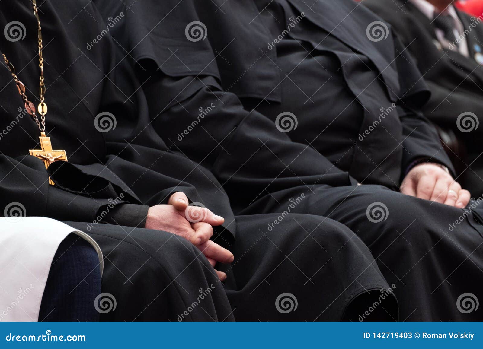 representatives of the orthodox clergy in black robes sit in the conference hall. meeting clerics and priests. conceptual