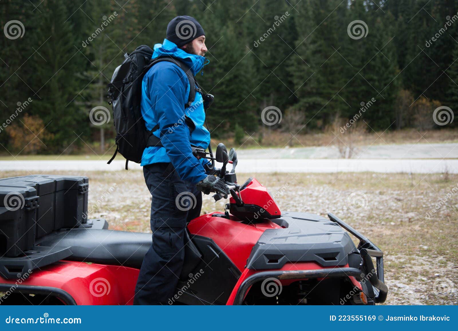 Rescuer Inspecting Woods Area by Atv Quad Bike Stock Image Image of