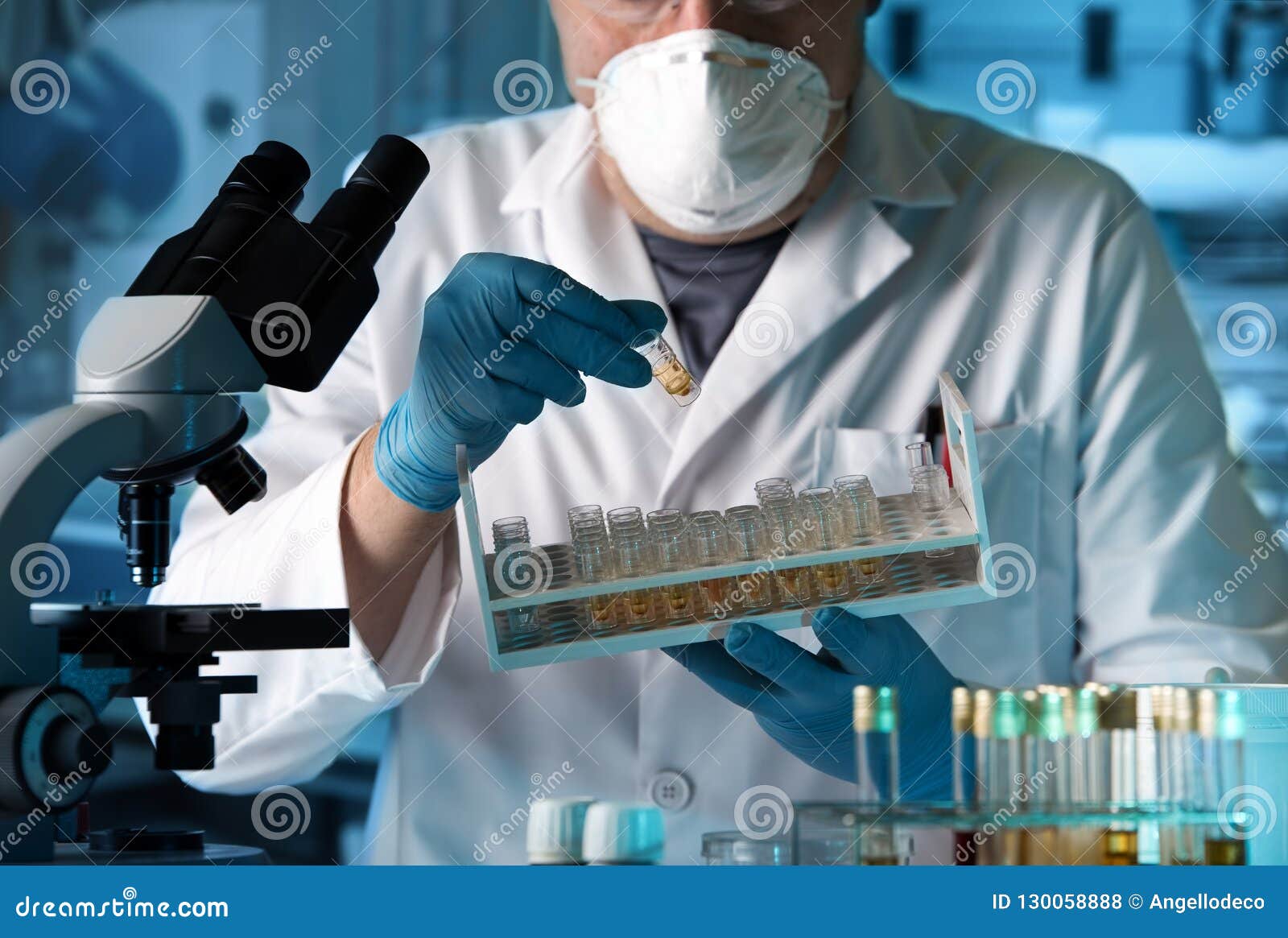 Researcher Holding Tray with Tube Test for Analysis in Laboratory Stock