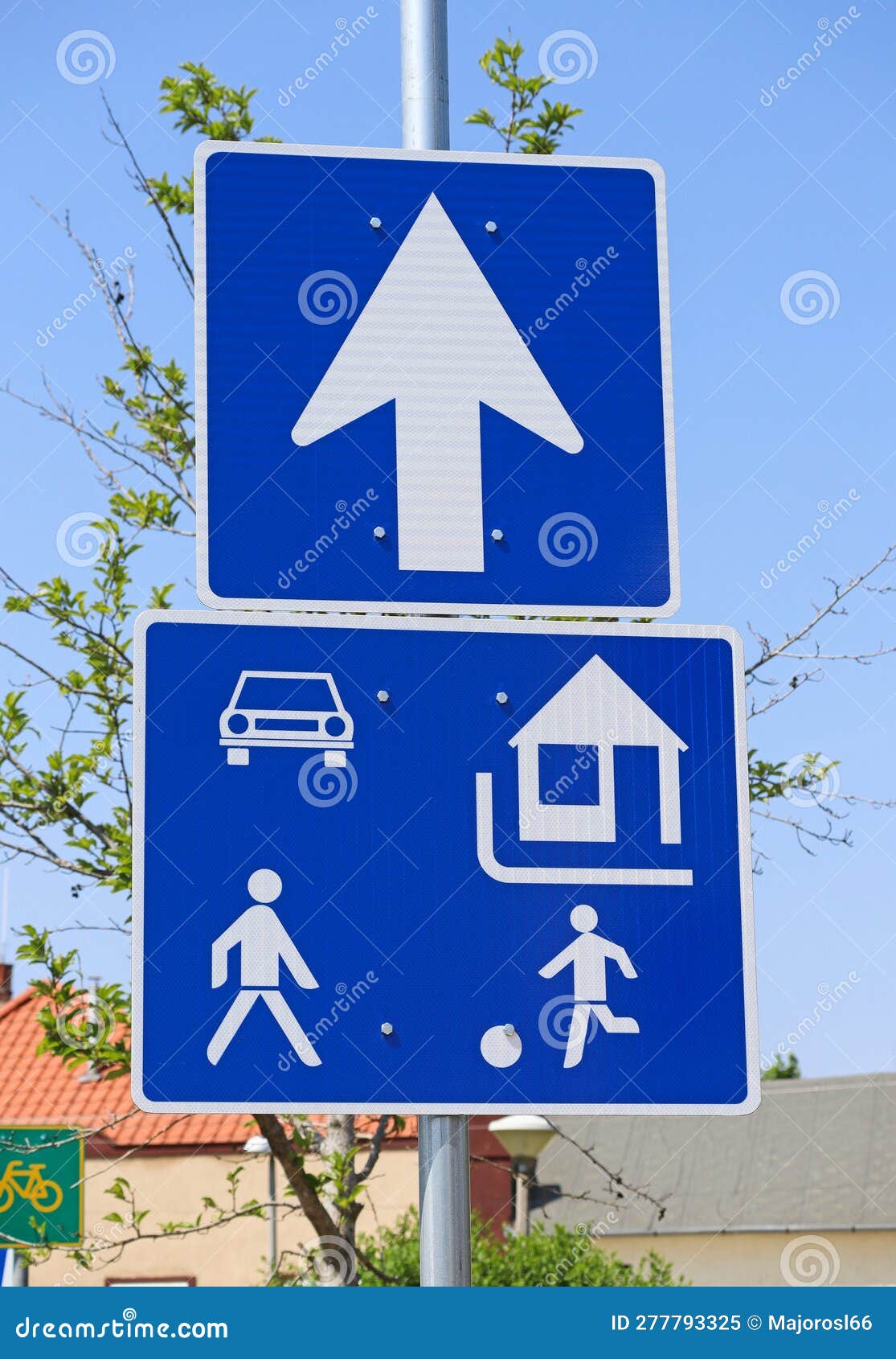 Residential Area and Arrow Traffic Signs on the Street Stock Image