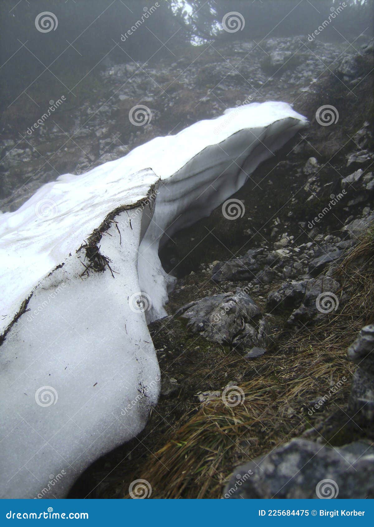 residual snow at pyramidenspitze mountain hiking tour in tyrol, austria