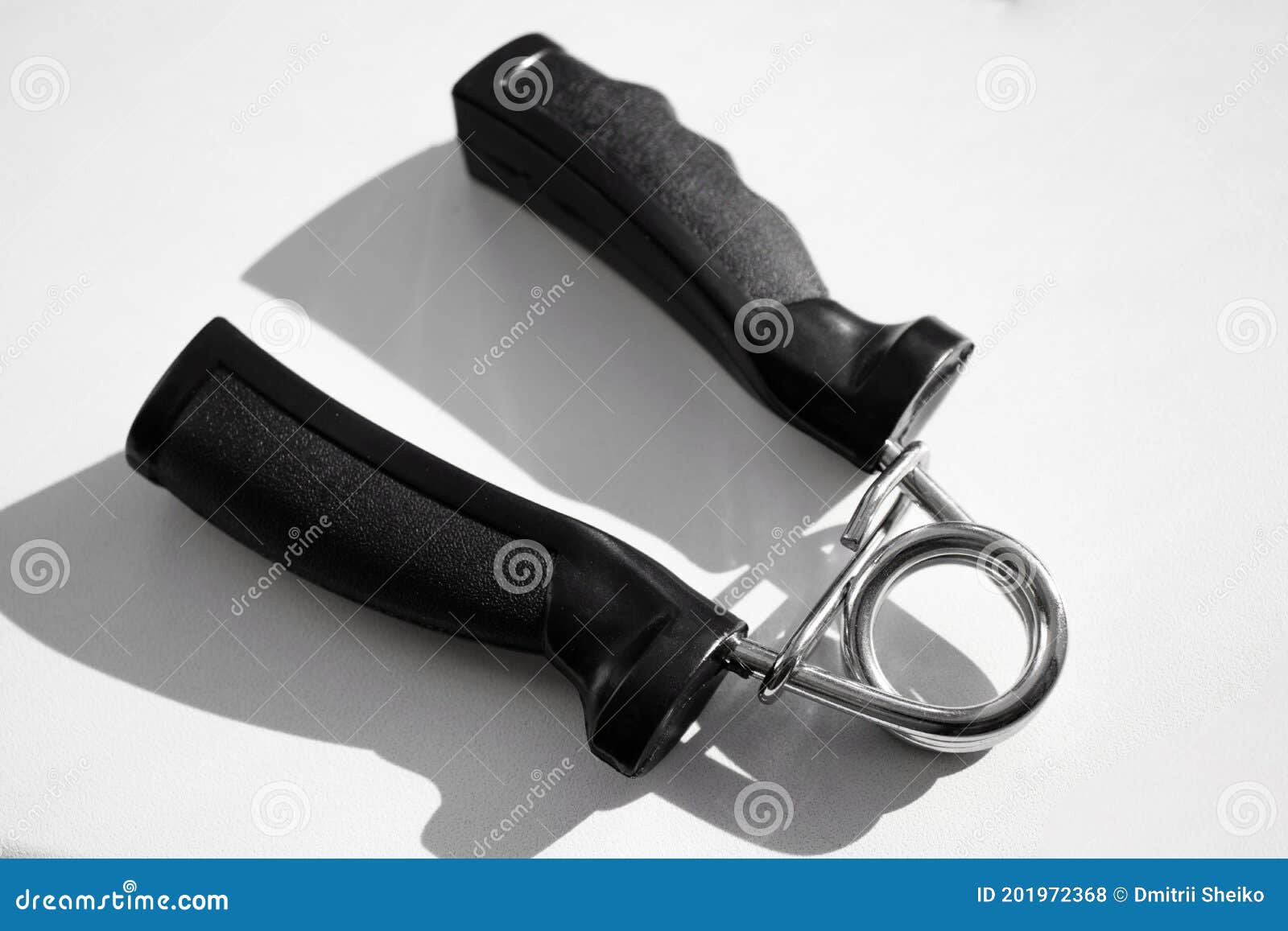resistance band for hand exercise on a white background