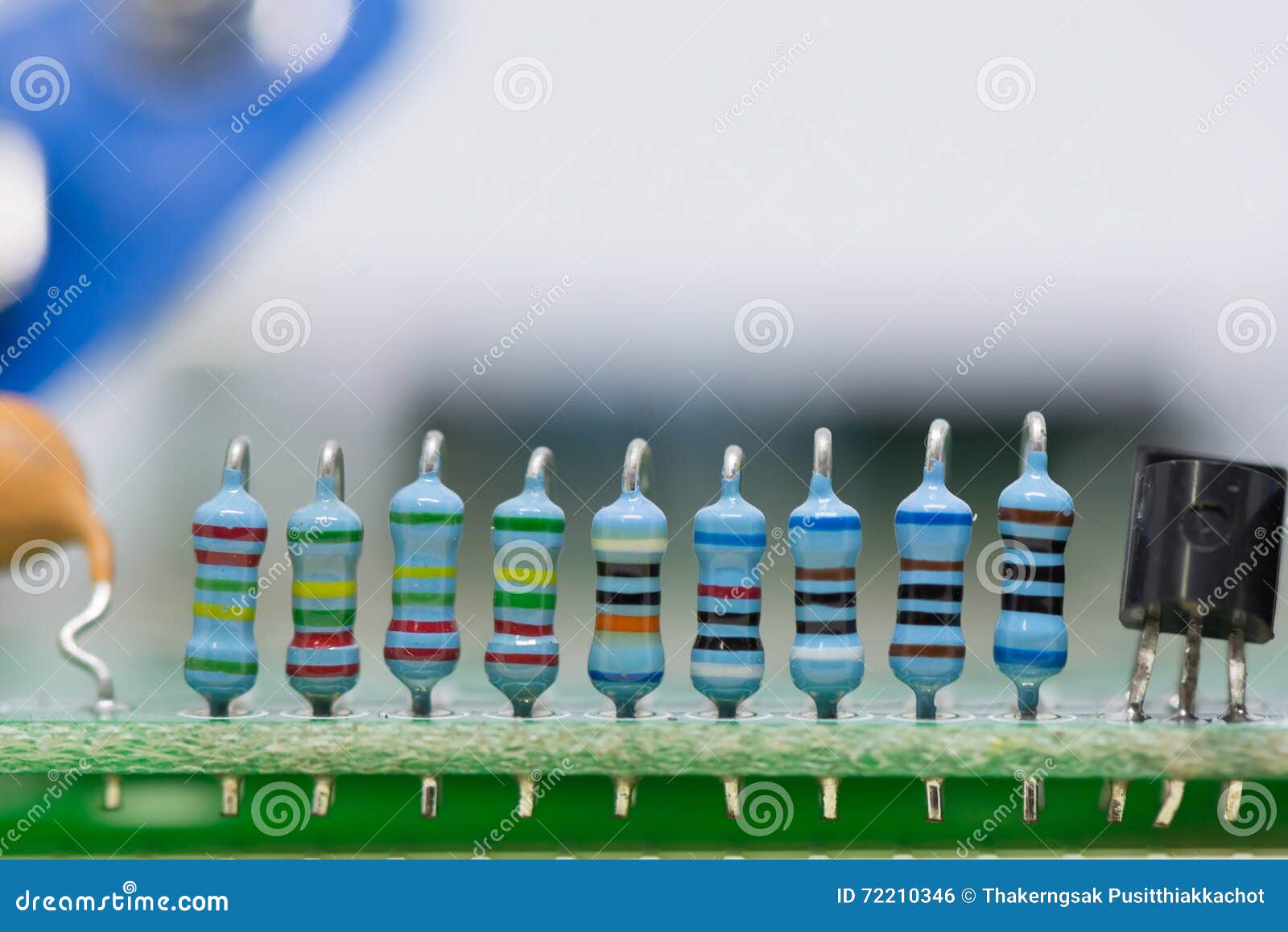Resistors and Capacitors on the Motherboard. Stock Photo Image of