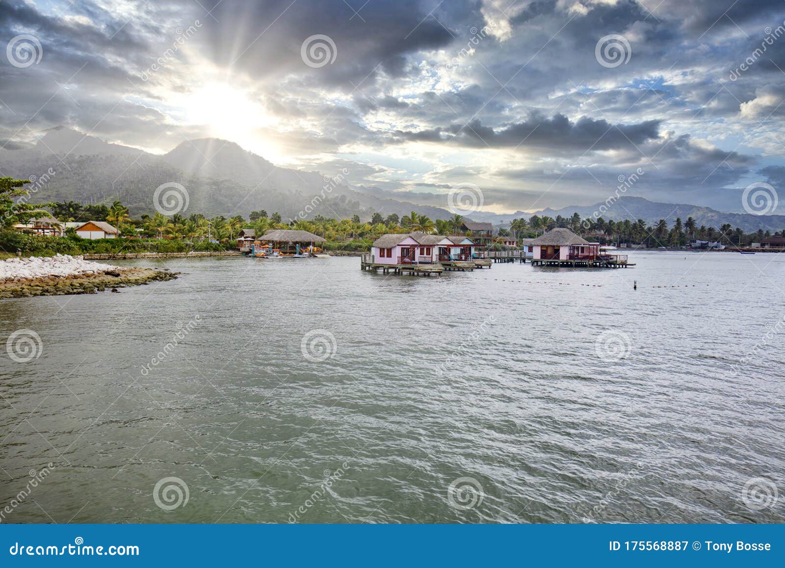 resort lodging on the water at sunrise