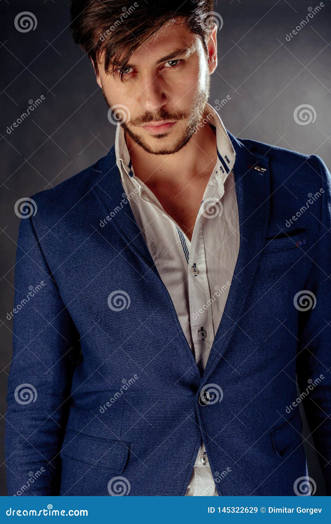 Respectable Handsome Man in a Suit in Modern Studio Stock Image - Image ...