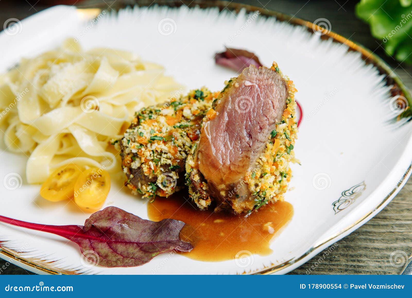 beef medium reir with macaroni on a plate