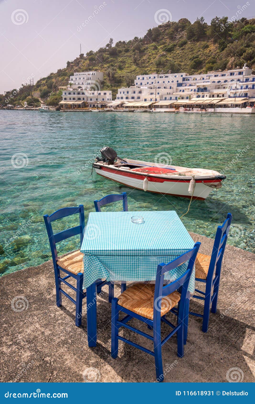 Restaurant Tables by the Sea in the Scenic Village of Loutro in Crete ...