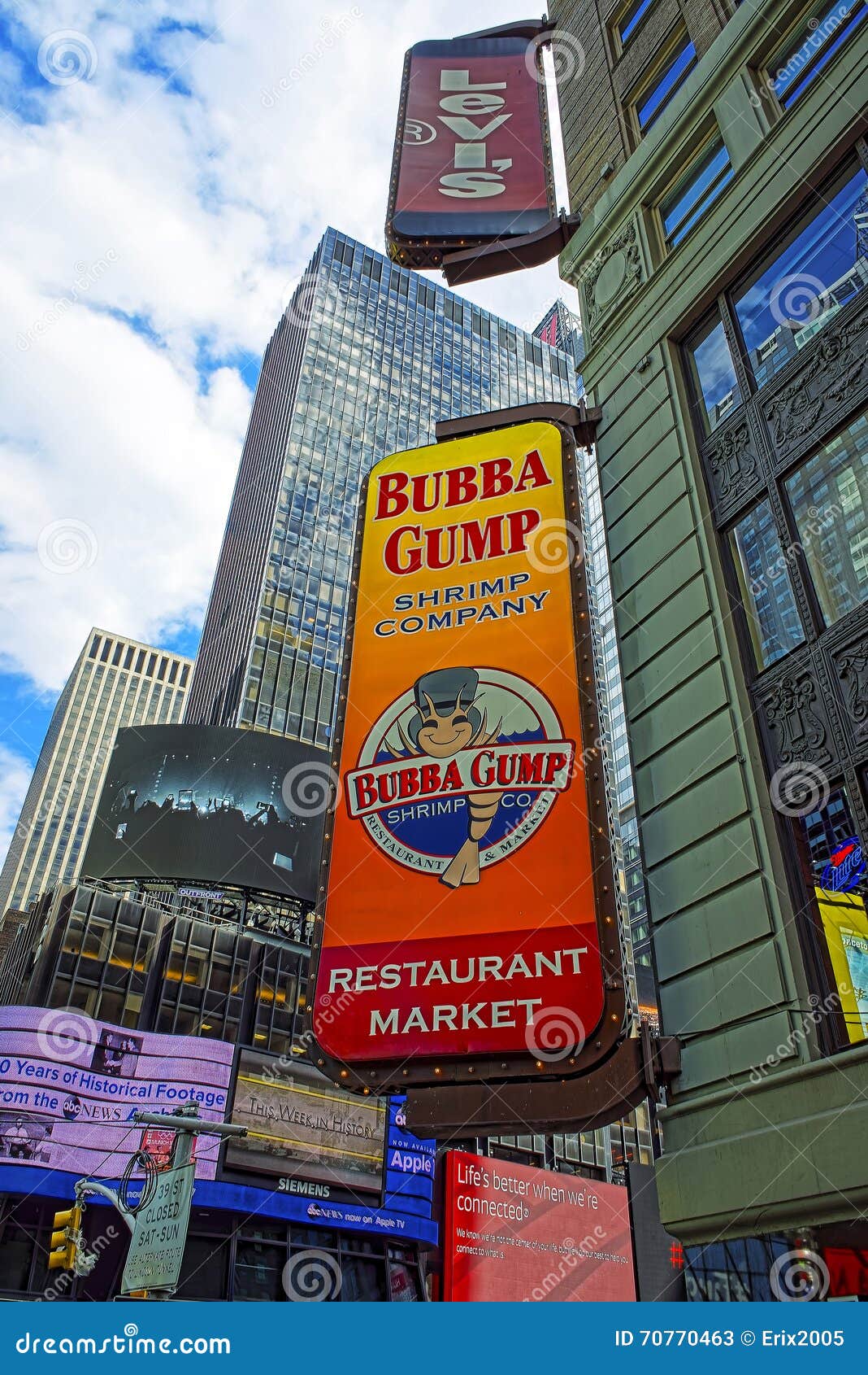 Restaurants at 7th Avenue and West 44th Street Midtown Manhattan. NEW YORK, USA - APRIL 24, 2015: Restaurants business-signs at Intersection of 7th Avenue and West 44th Street in Midtown Manhattan, New York, USA. It is Times Square, an intersection between Broadway and 7th Avenue