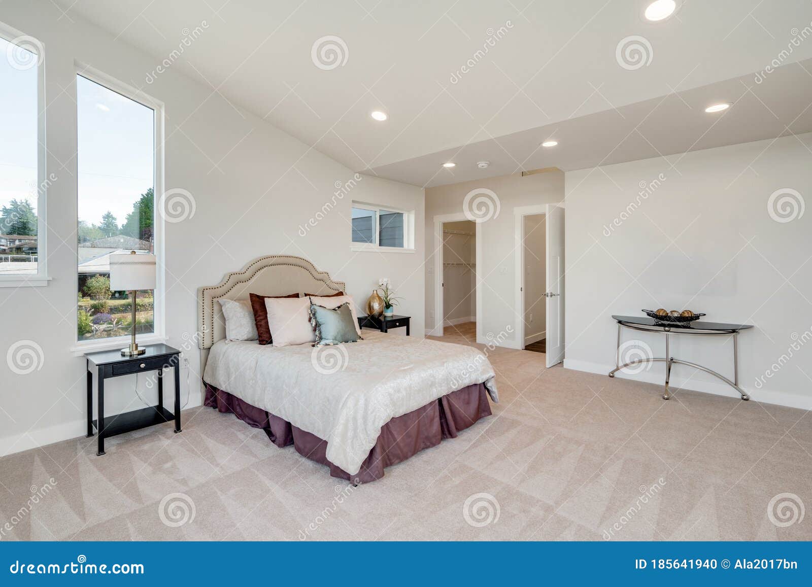 Restful Bedroom Interior with Master Bed Placed Under a Sloped Ceiling