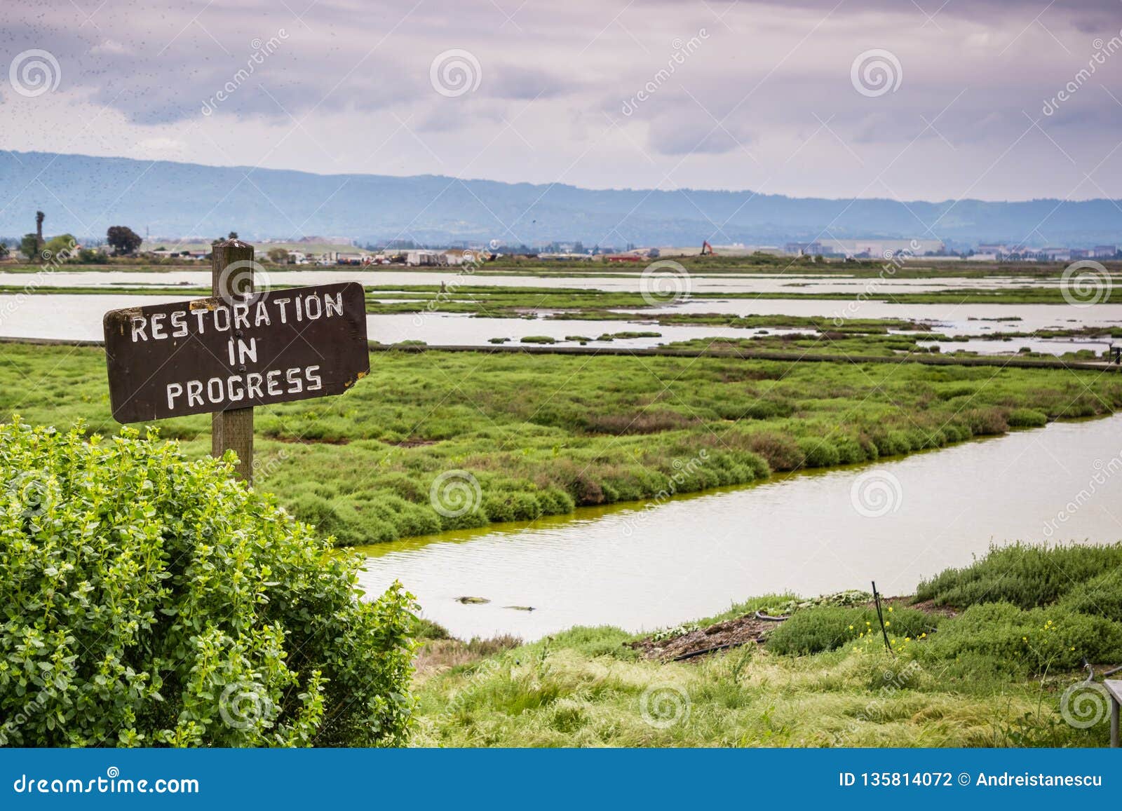 restoration sign in the wetlands in alviso marsh, don edwards wildlife refuge, south san francisco bay, california