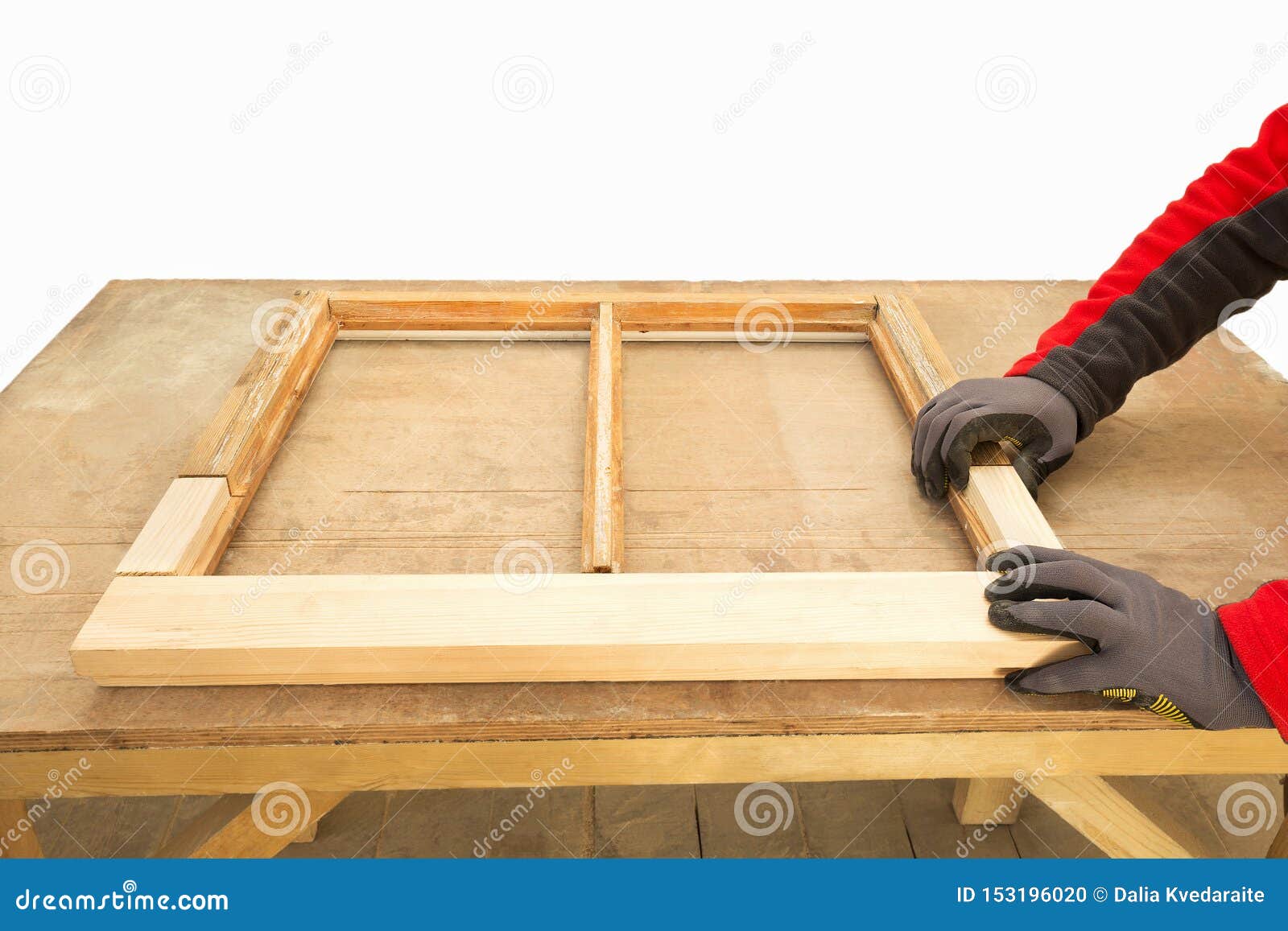 close up of a carpenter repairing sash window frame