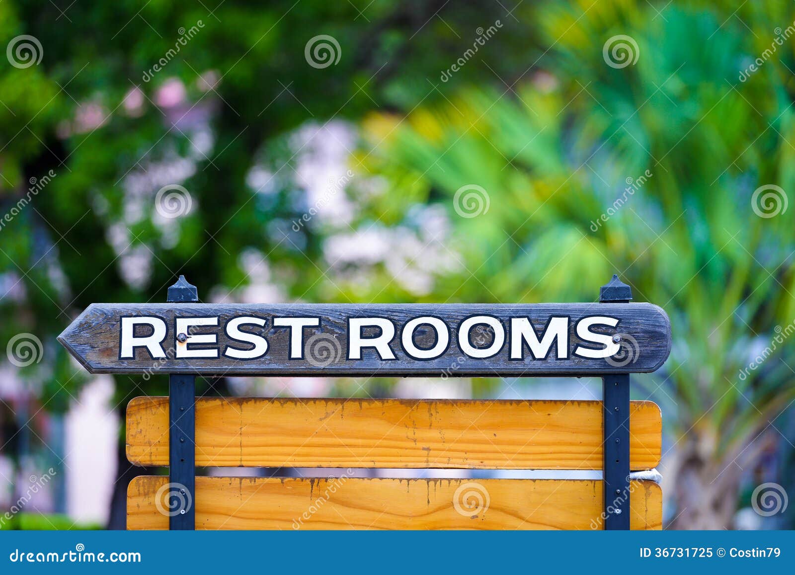 Restroom Sign Outdoors stock image. Image of women, arrow 36731725