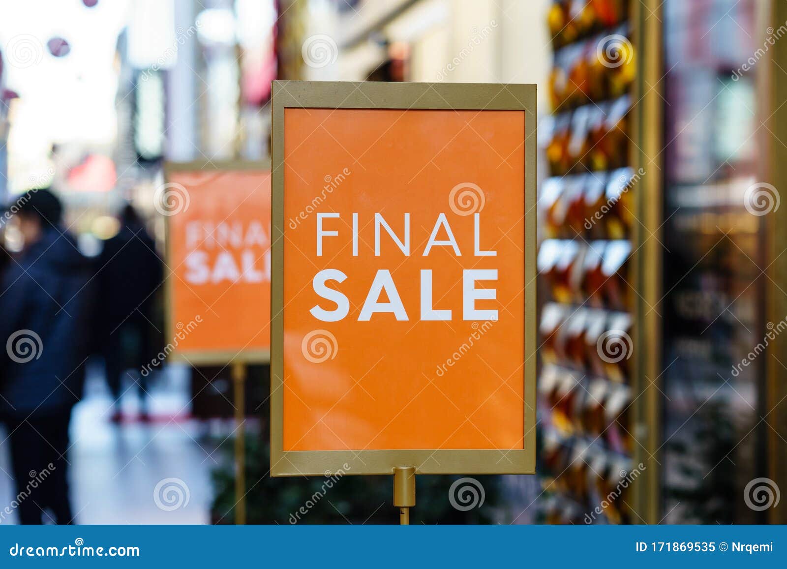 Premium Photo  Clothes on the rail and a sale sign final sale discounts