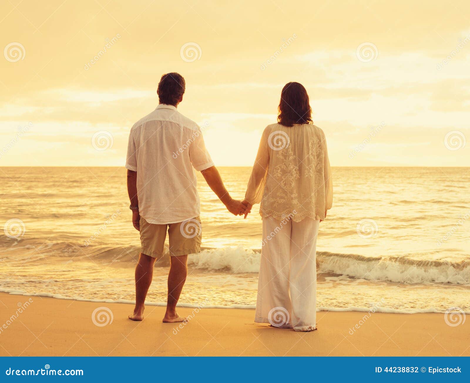 retired couple on the beach