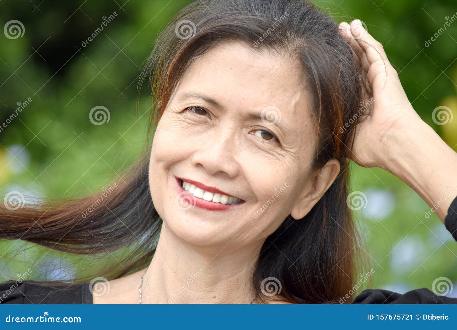 A Retired Filipina Female Senior Smiling Stock Image Image Of