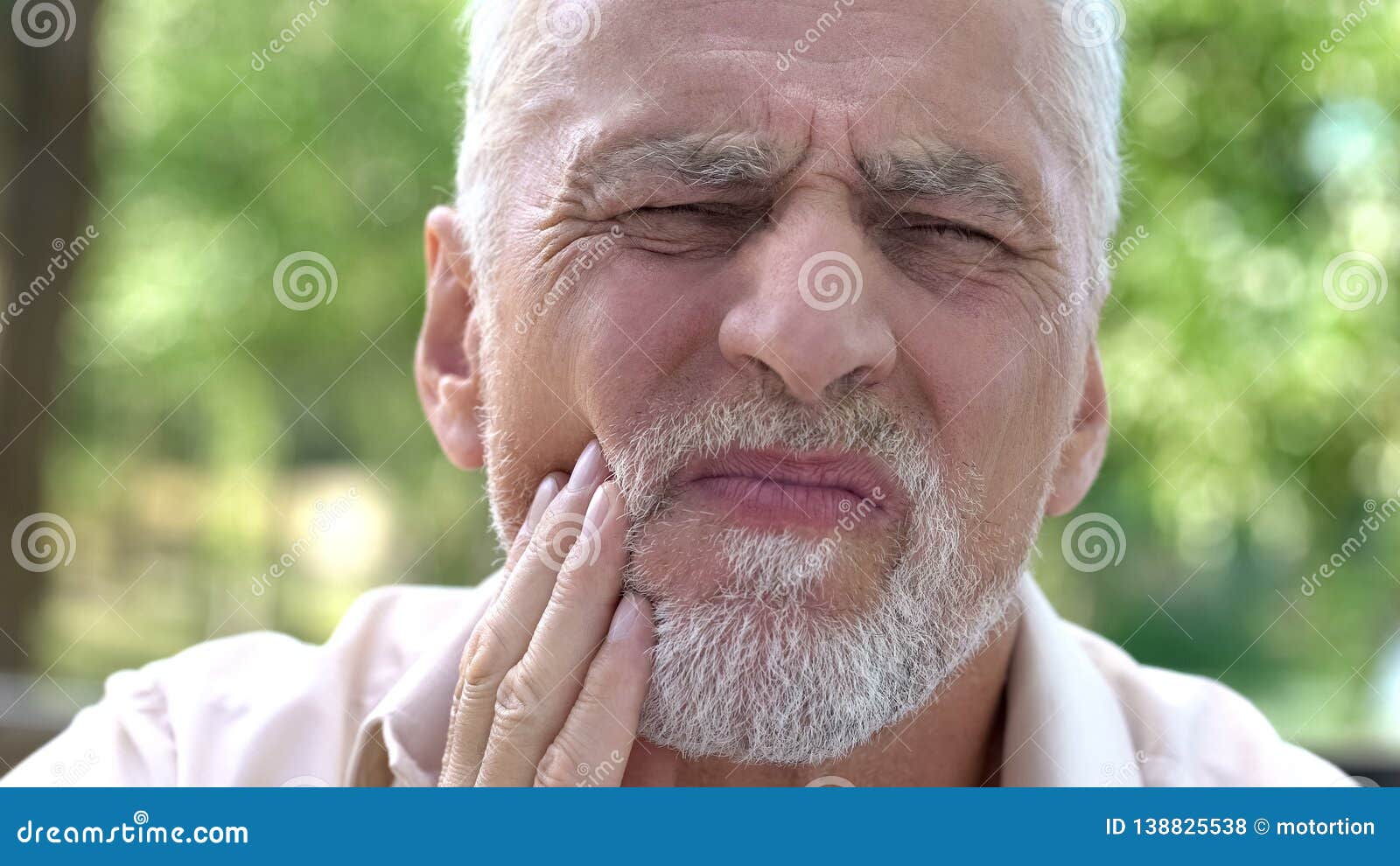 Retired Man Suffering from Toothache, Discomfort with Implants, Dental ...