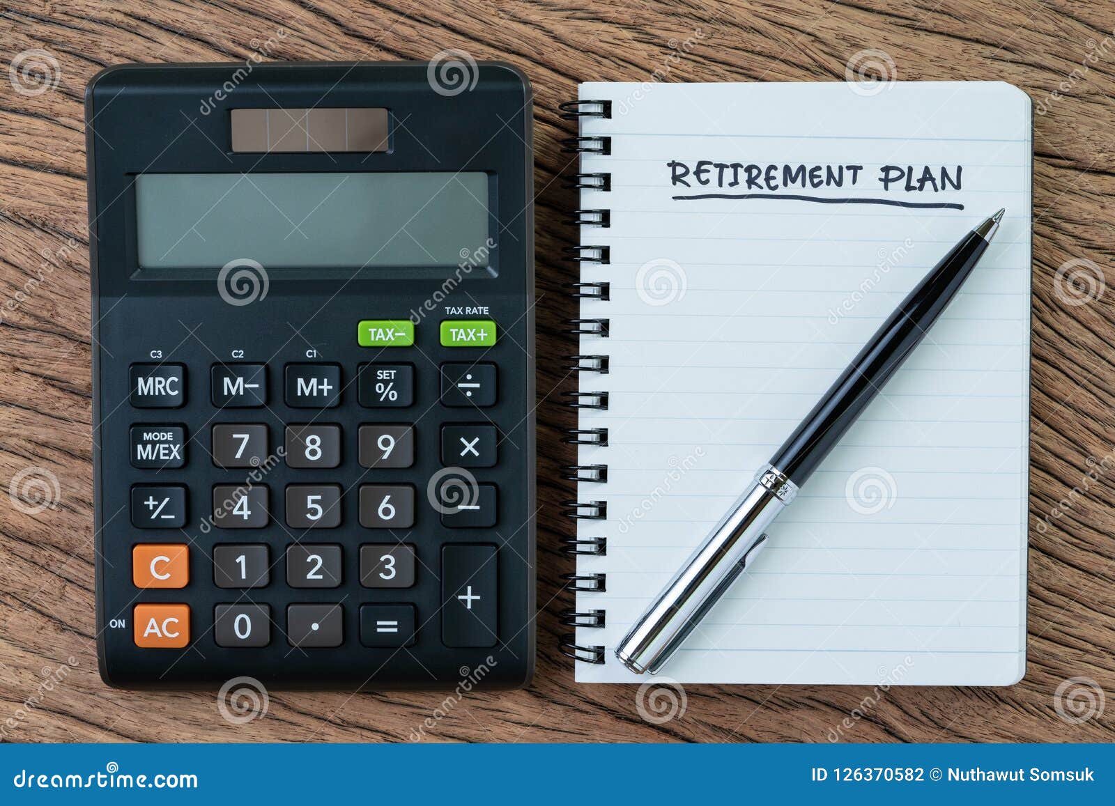 Retirement Planning Concept, Calculator With Empty Notepad With Stock