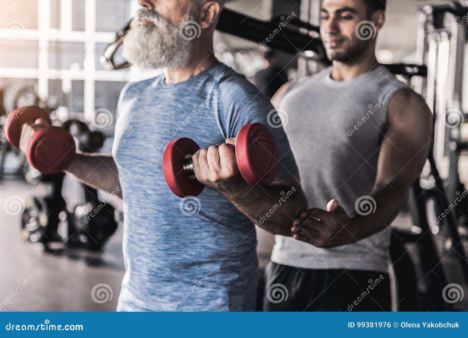 Old Bearded Man Having Workout in Gym with Professional Instructor ...